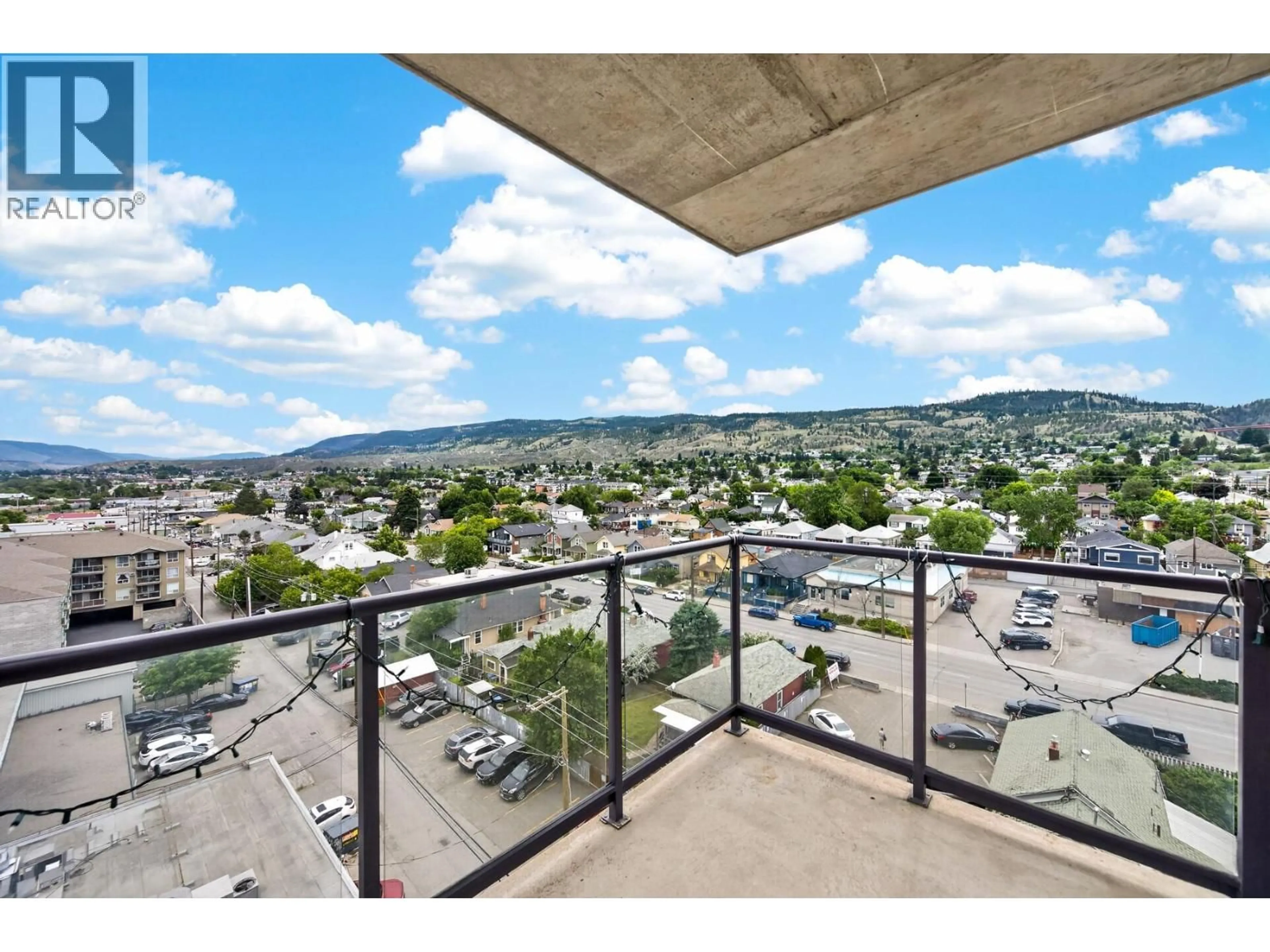 Patio, city buildings view from balcony for 806 - 619 VICTORIA STREET, Kamloops British Columbia V2C6W7