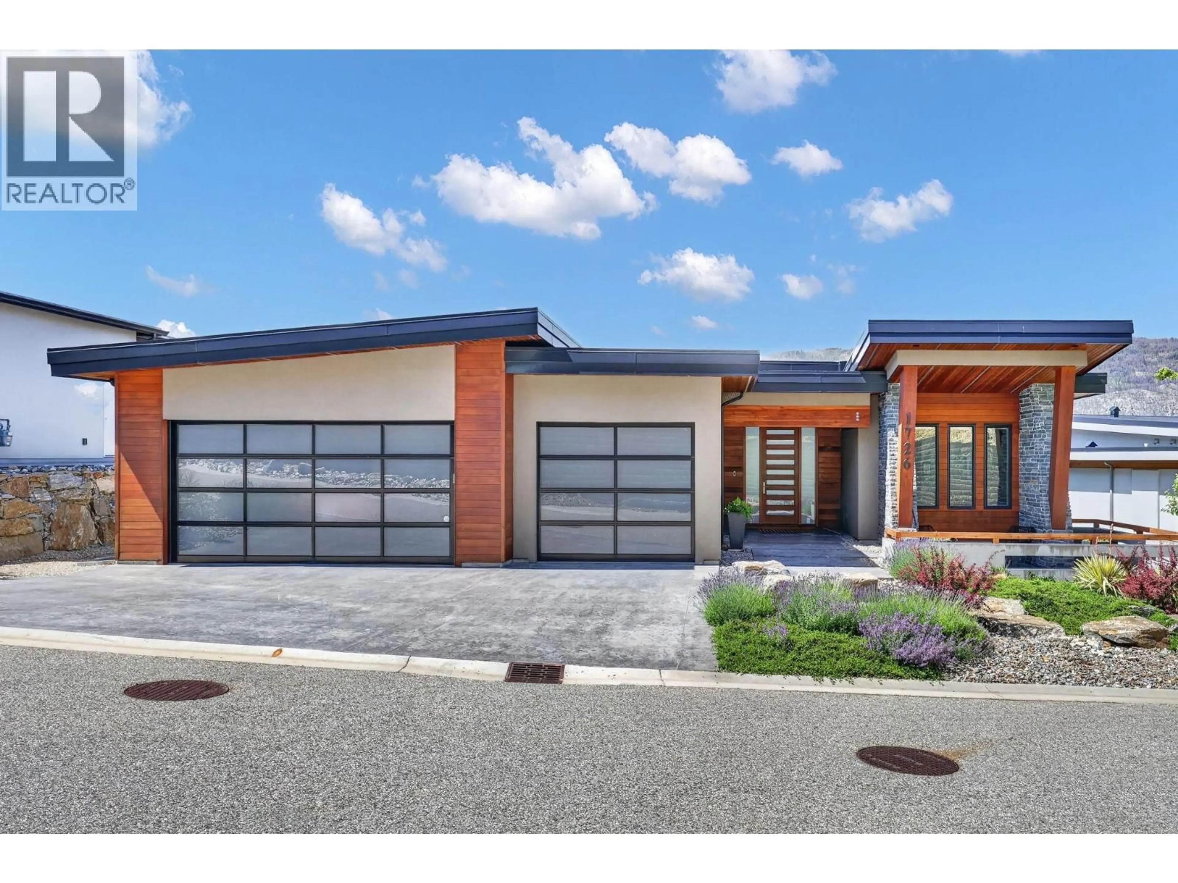 Home with brick exterior material, street for 1726 LIMESTONE DRIVE, Lake Country British Columbia V4V2T4