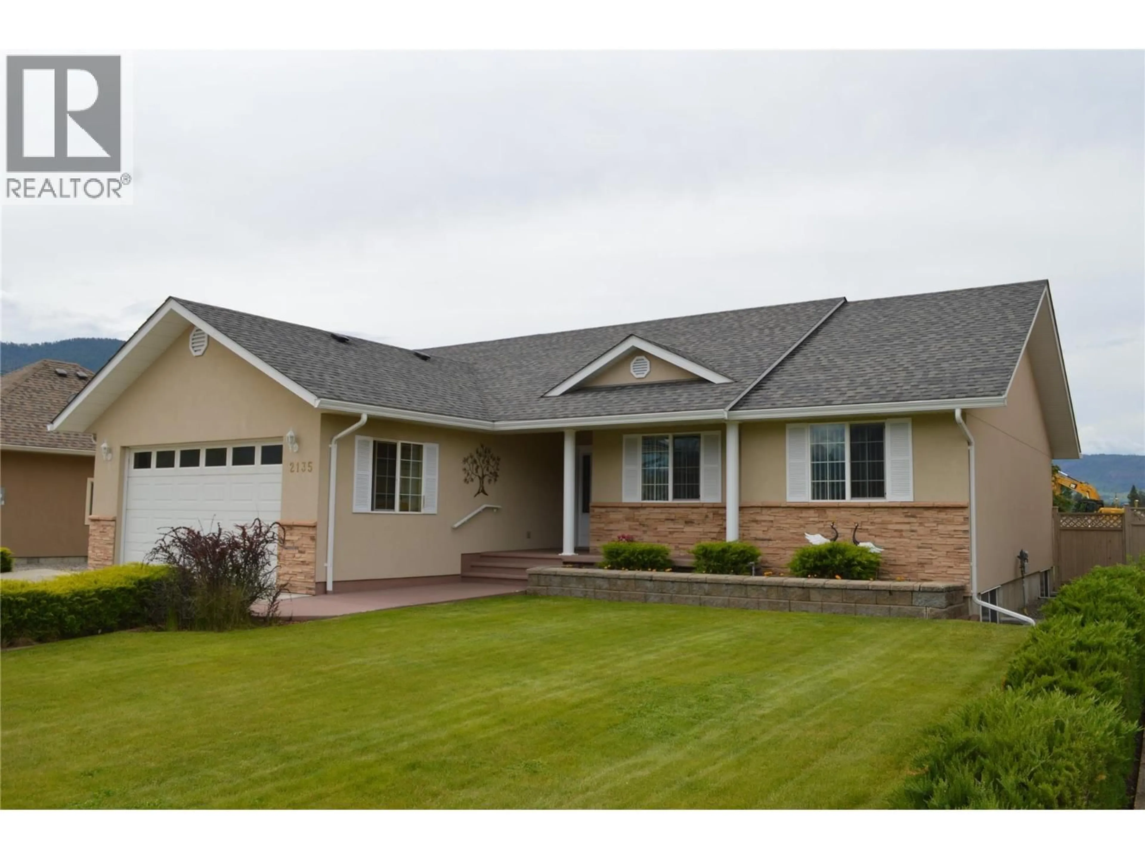 Home with vinyl exterior material, street for 2135 BRYCEN PLACE, Grand Forks British Columbia V0H1H0