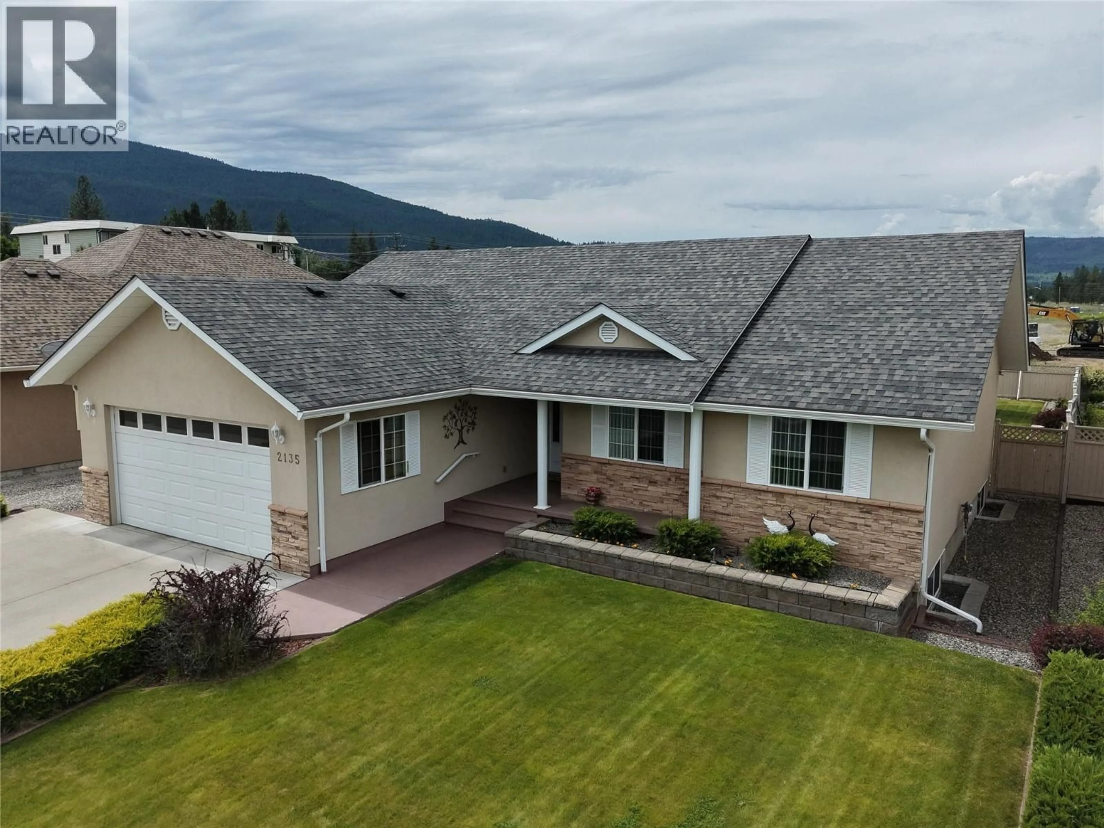 A pic from outside/outdoor area/front of a property/back of a property/a pic from drone, mountain view for 2135 BRYCEN PLACE, Grand Forks British Columbia V0H1H0