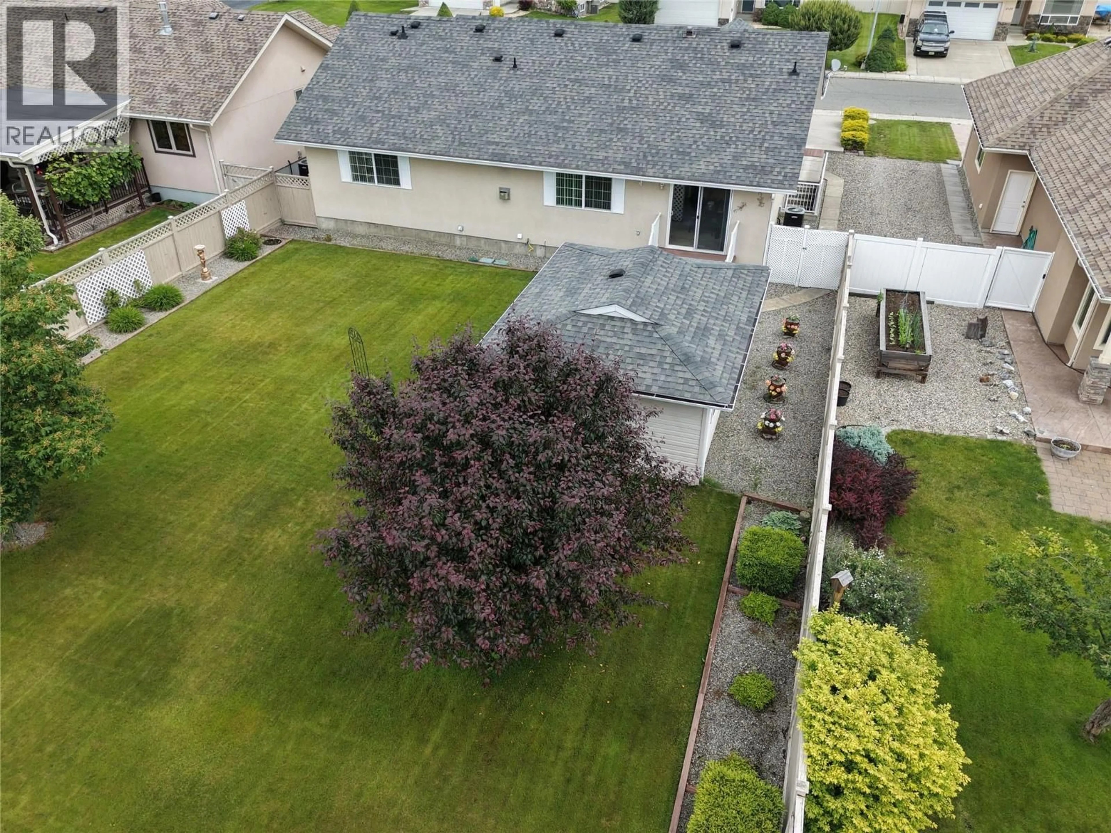 A pic from outside/outdoor area/front of a property/back of a property/a pic from drone, street for 2135 BRYCEN PLACE, Grand Forks British Columbia V0H1H0