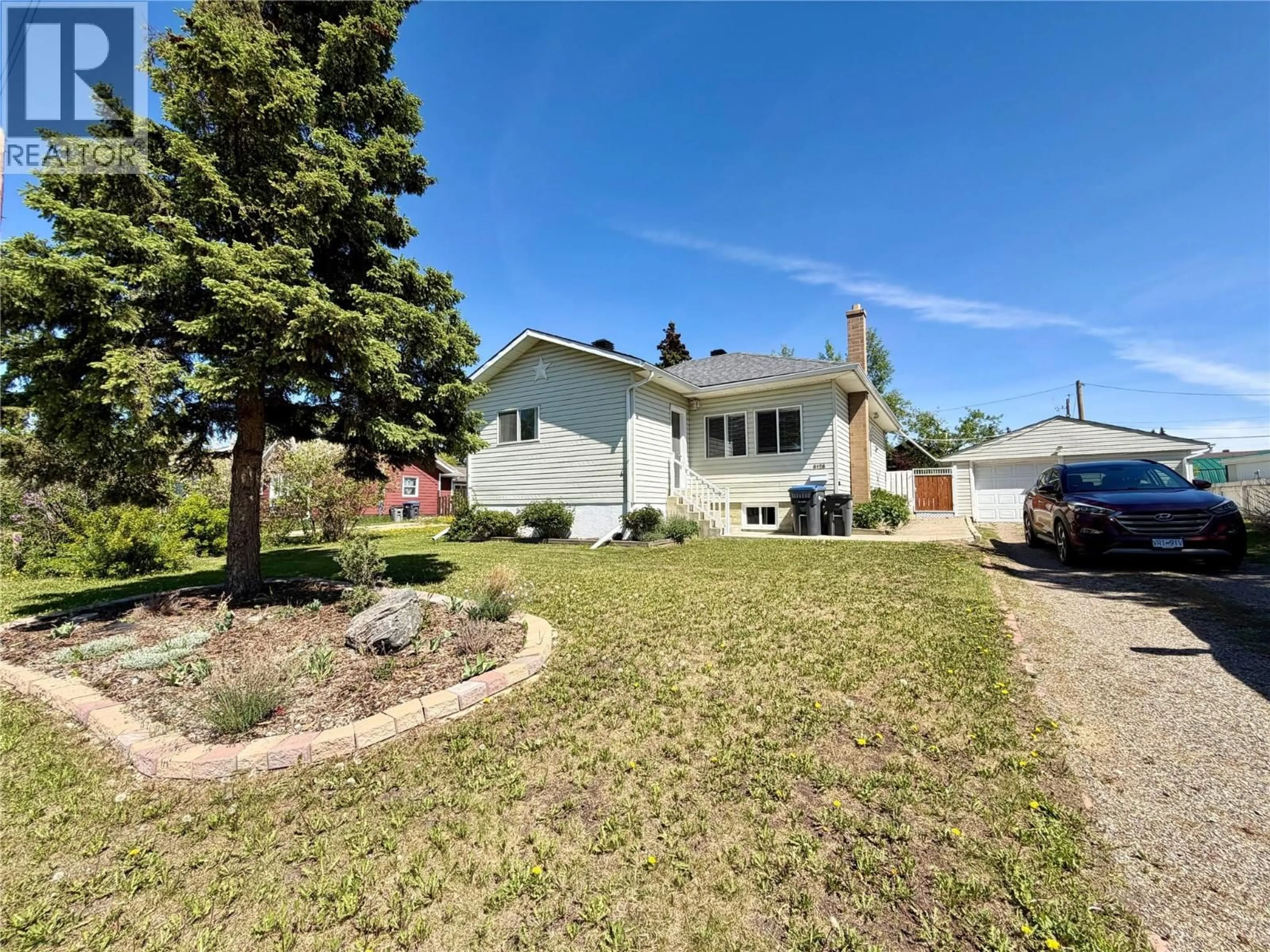 A pic from outside/outdoor area/front of a property/back of a property/a pic from drone, street for 9128 8 STREET, Dawson Creek British Columbia V1G3N4