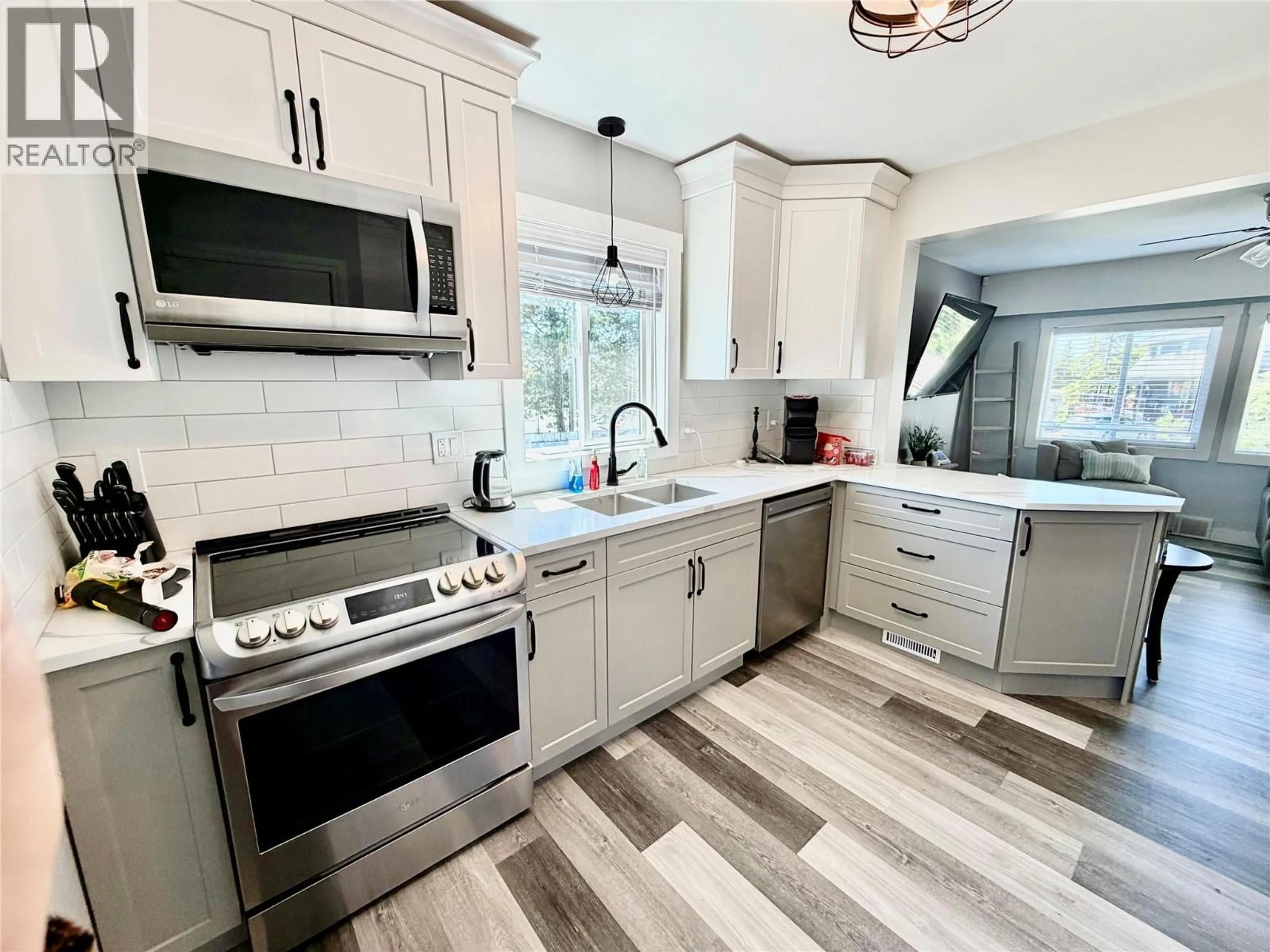 Open concept kitchen, ceramic/tile floor for 9128 8 STREET, Dawson Creek British Columbia V1G3N4