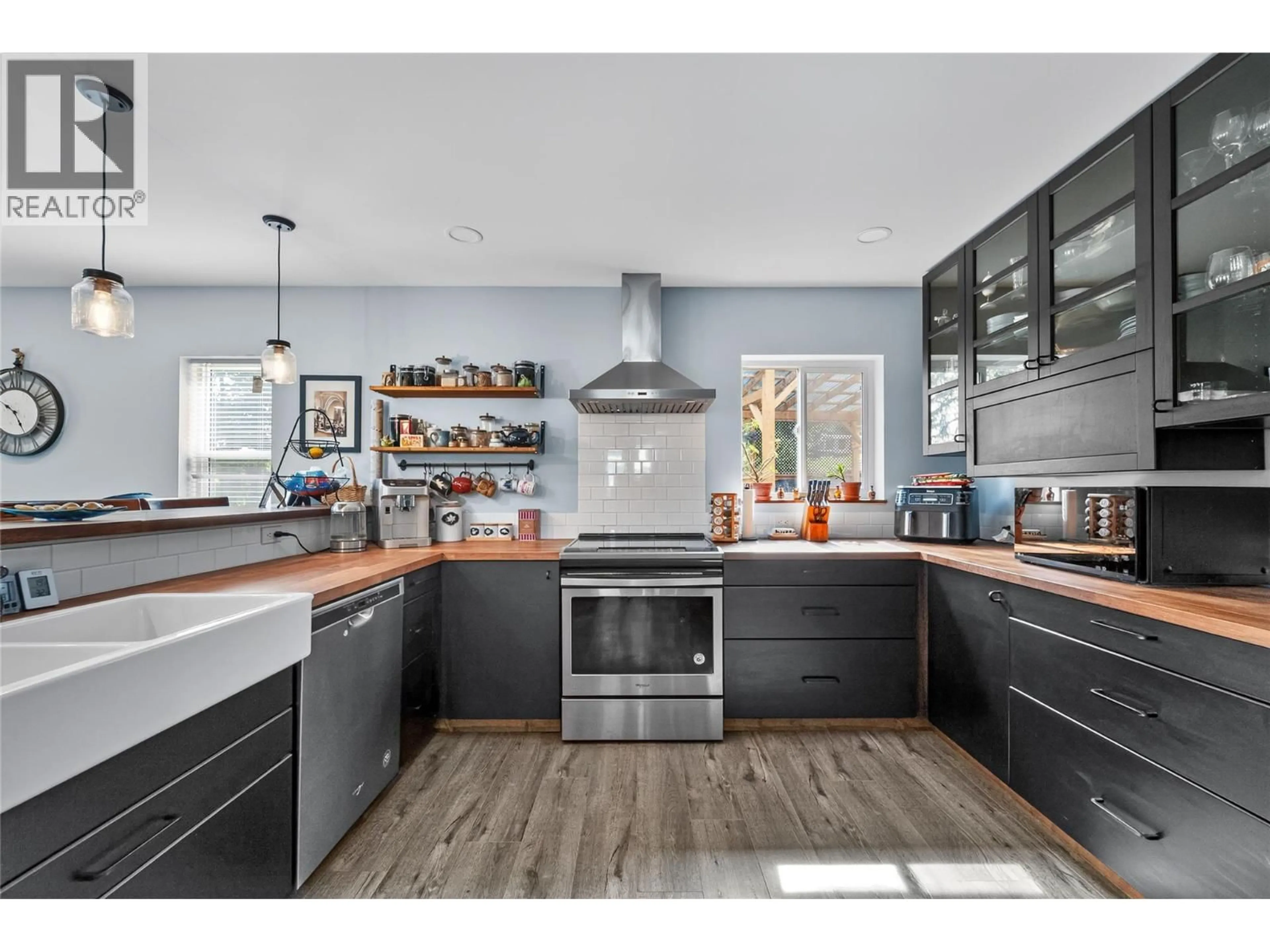 Open concept kitchen, wood/laminate floor for 3307 POWELL ROAD, Kamloops British Columbia V0E3E1