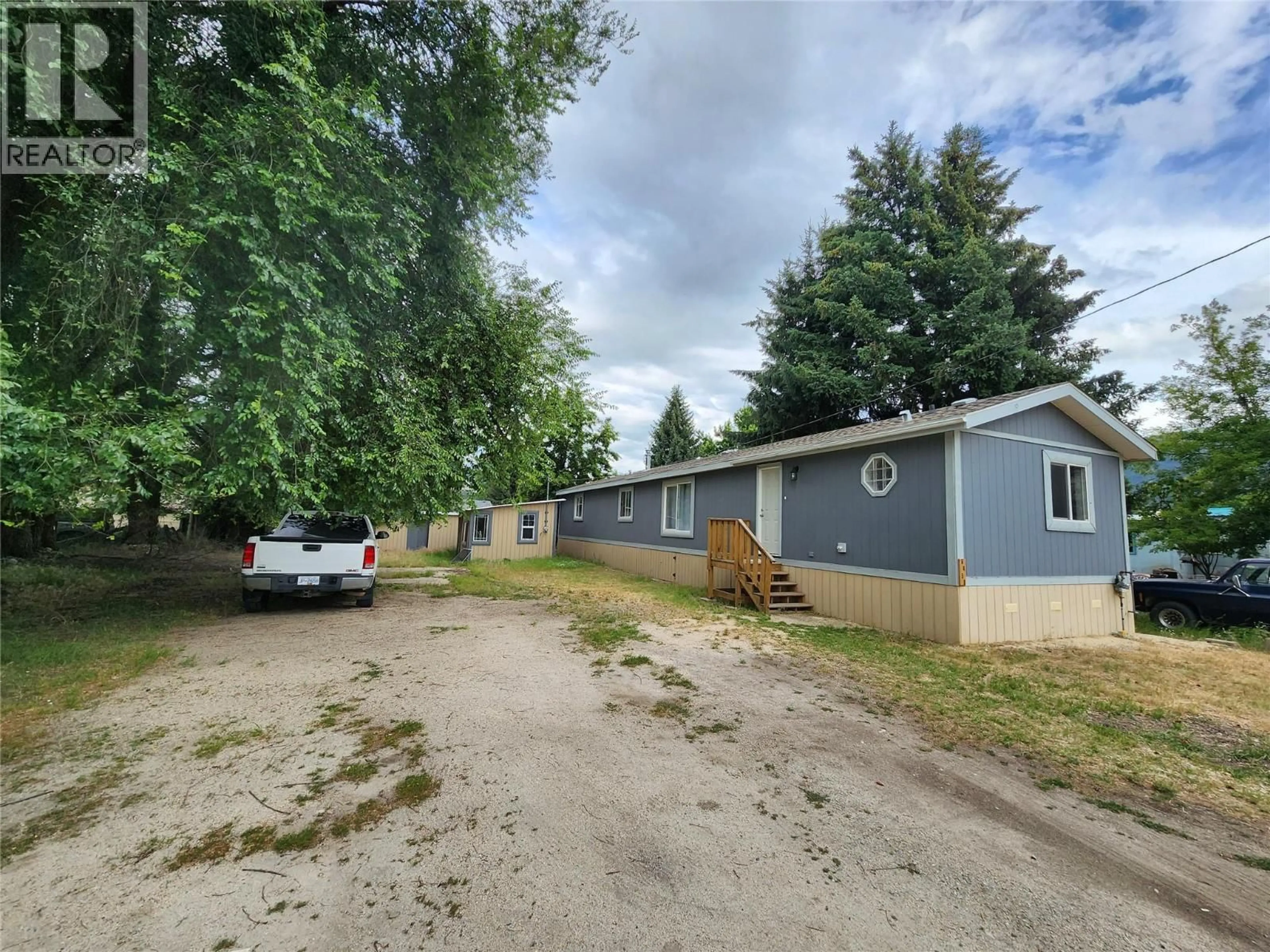 A pic from outside/outdoor area/front of a property/back of a property/a pic from drone, street for 6450 7TH STREET, Grand Forks British Columbia V0H1H4
