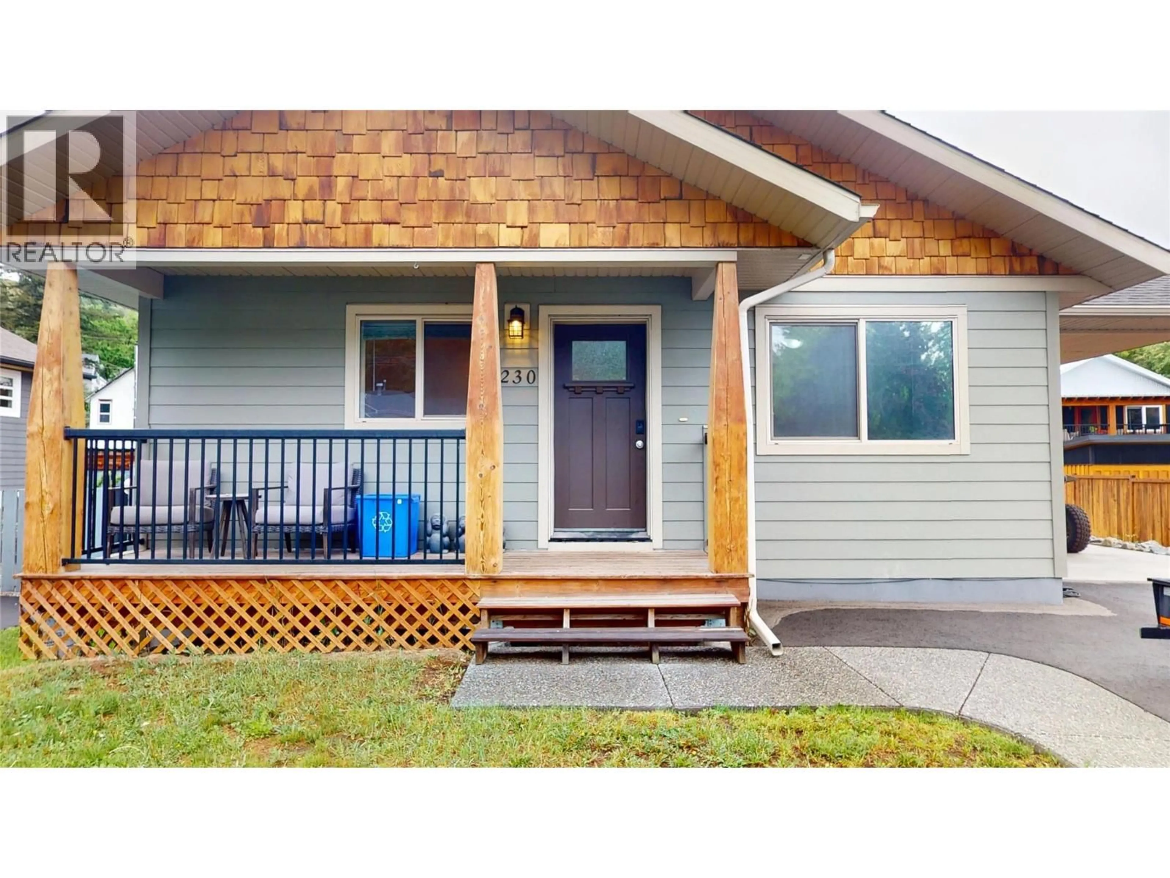 Home with vinyl exterior material, street for 230 303 AVENUE, Kimberley British Columbia V1A3G5