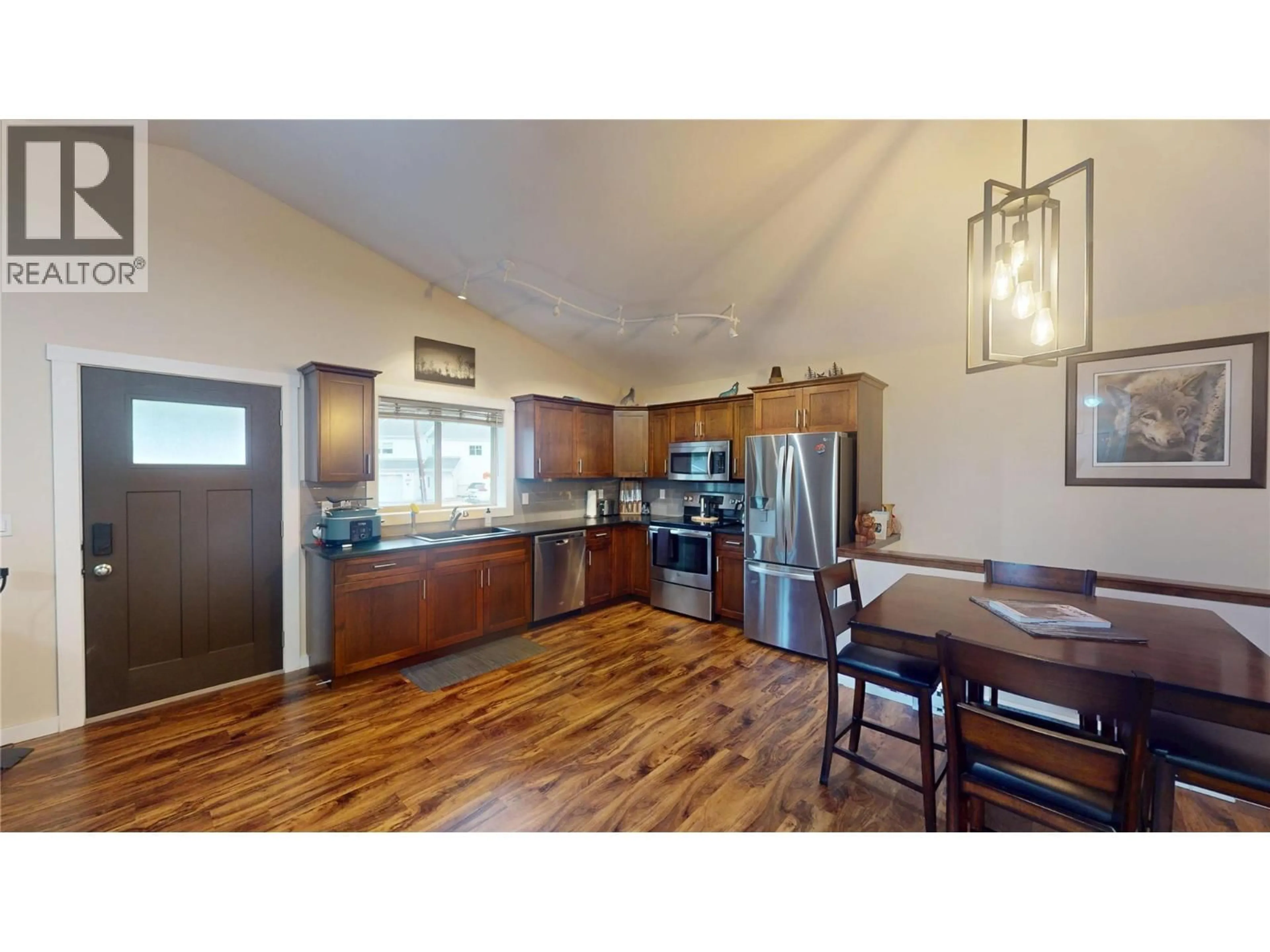 Open concept kitchen, wood/laminate floor for 230 303 AVENUE, Kimberley British Columbia V1A3G5