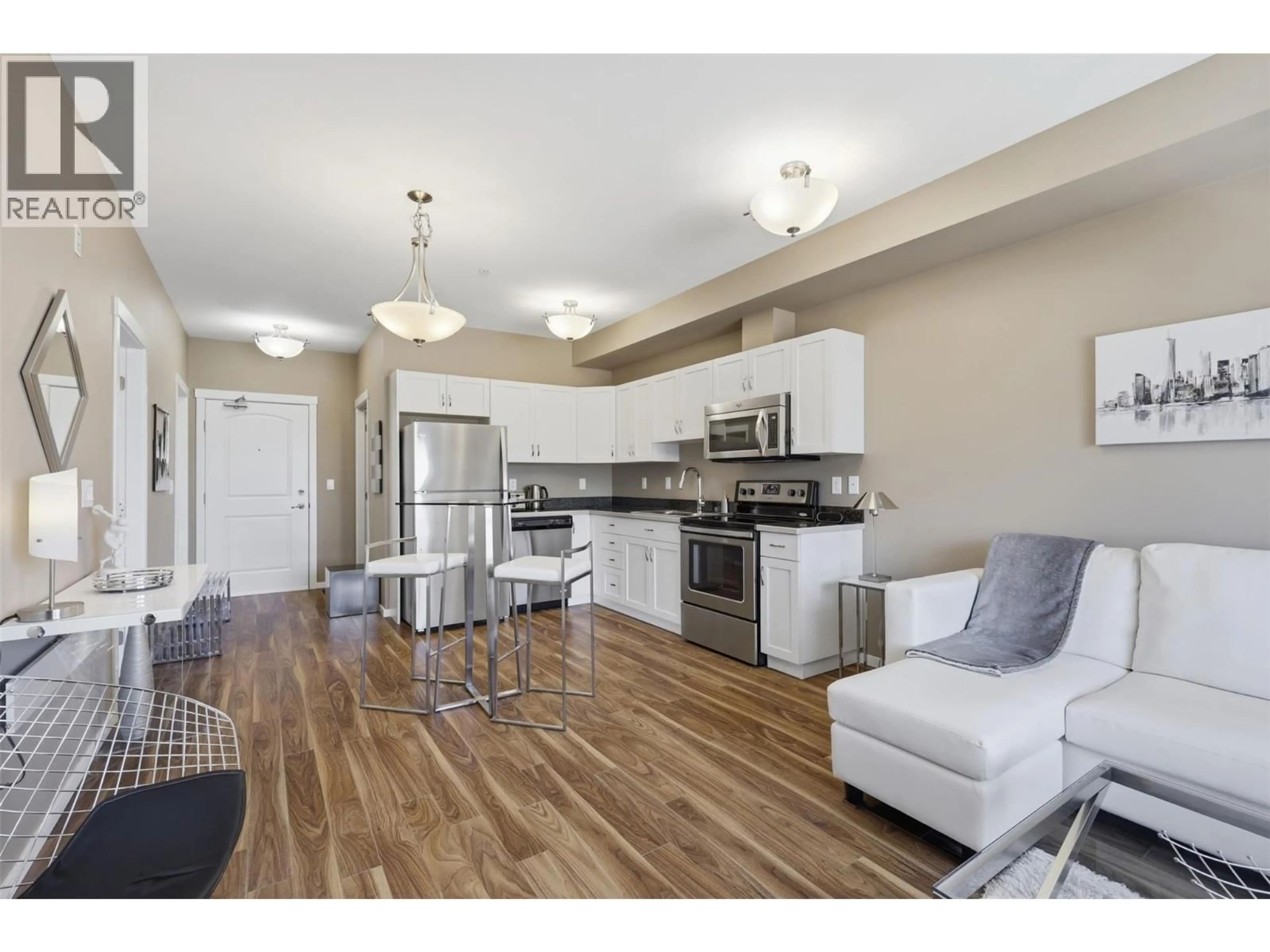 Open concept kitchen, wood/laminate floor for 503 - 429 ST. PAUL STREET, Kamloops British Columbia V2C2J7