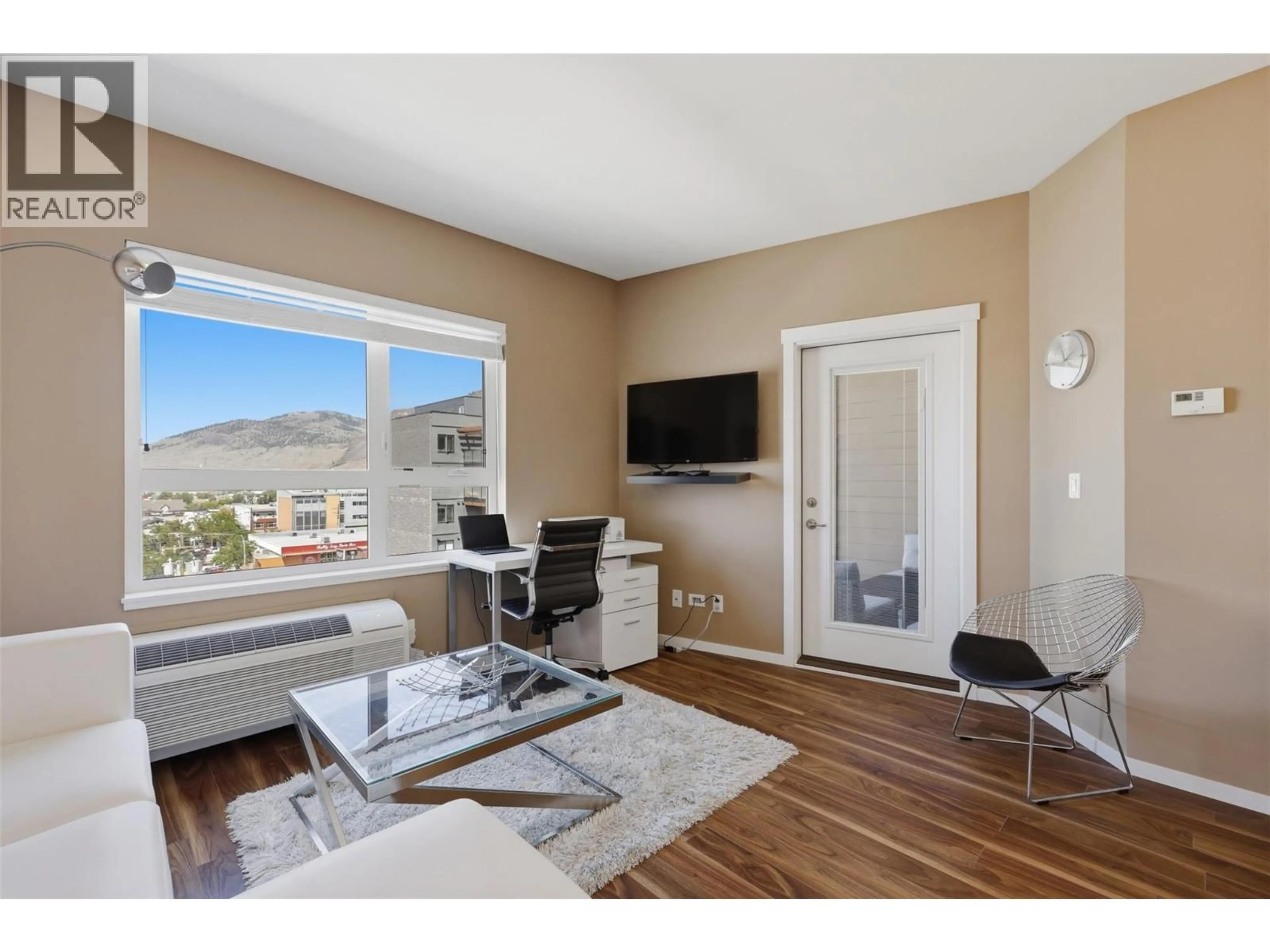 Living room with furniture, wood/laminate floor for 503 - 429 ST. PAUL STREET, Kamloops British Columbia V2C2J7
