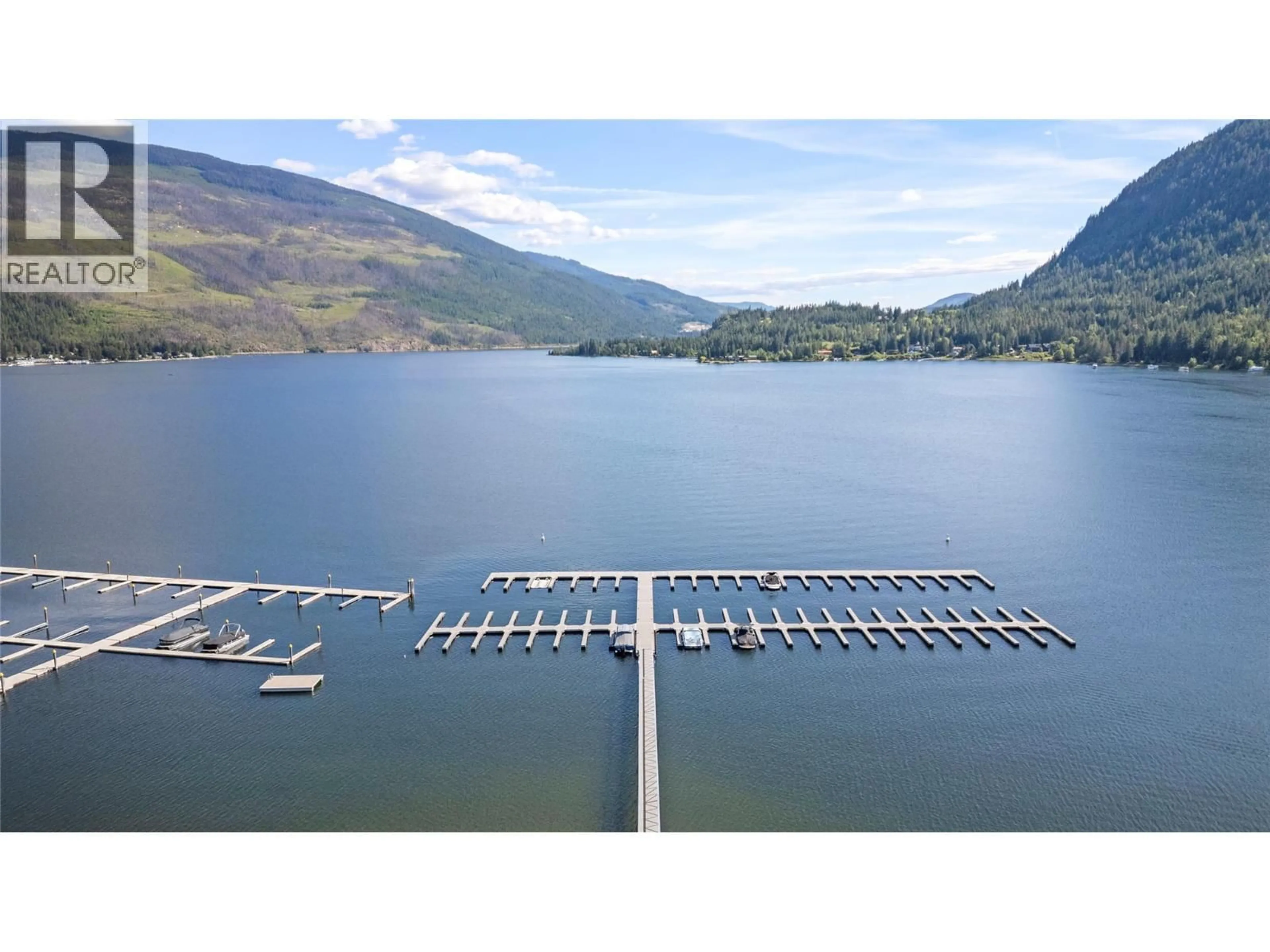 A pic from outside/outdoor area/front of a property/back of a property/a pic from drone, water/lake/river/ocean view for 243 - 213 WHITE PINE CRESCENT, Sicamous British Columbia V0E2V1