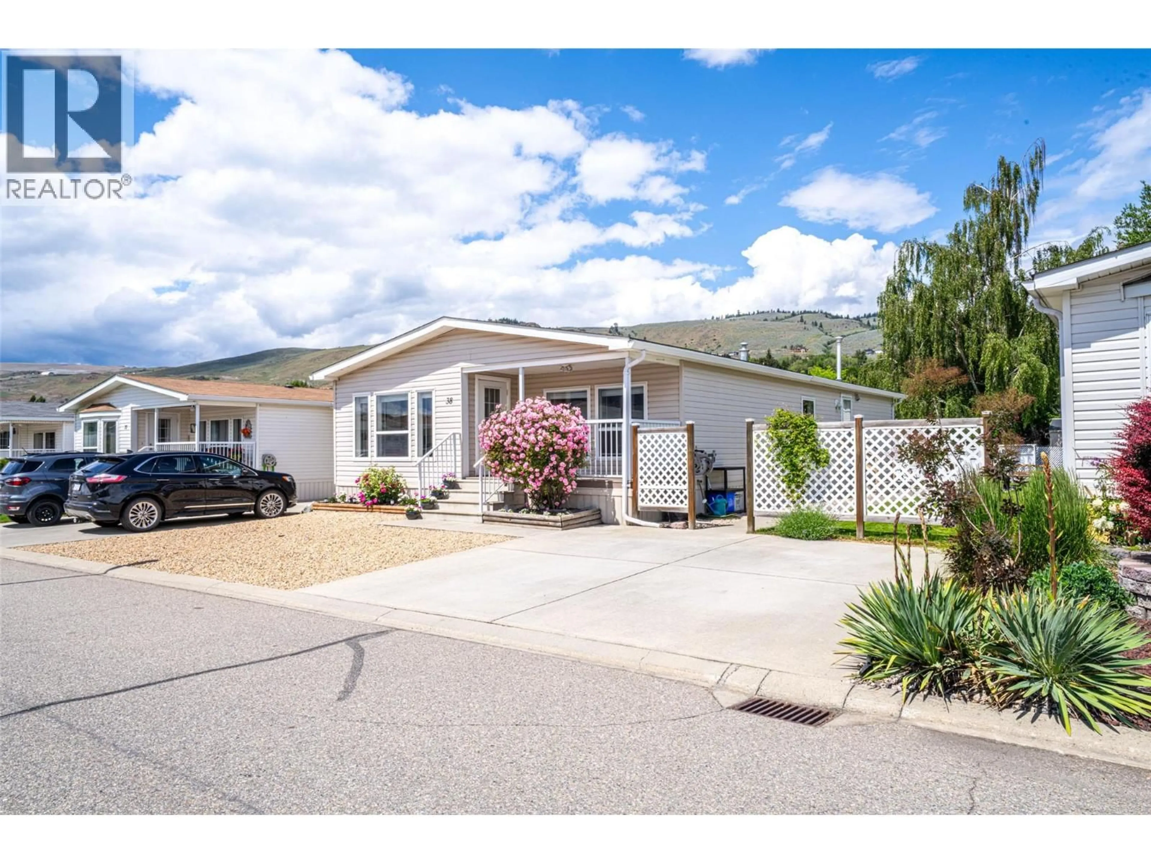 Home with vinyl exterior material, mountain view for 38 - 6688 TRONSON ROAD, Vernon British Columbia V1H1R9
