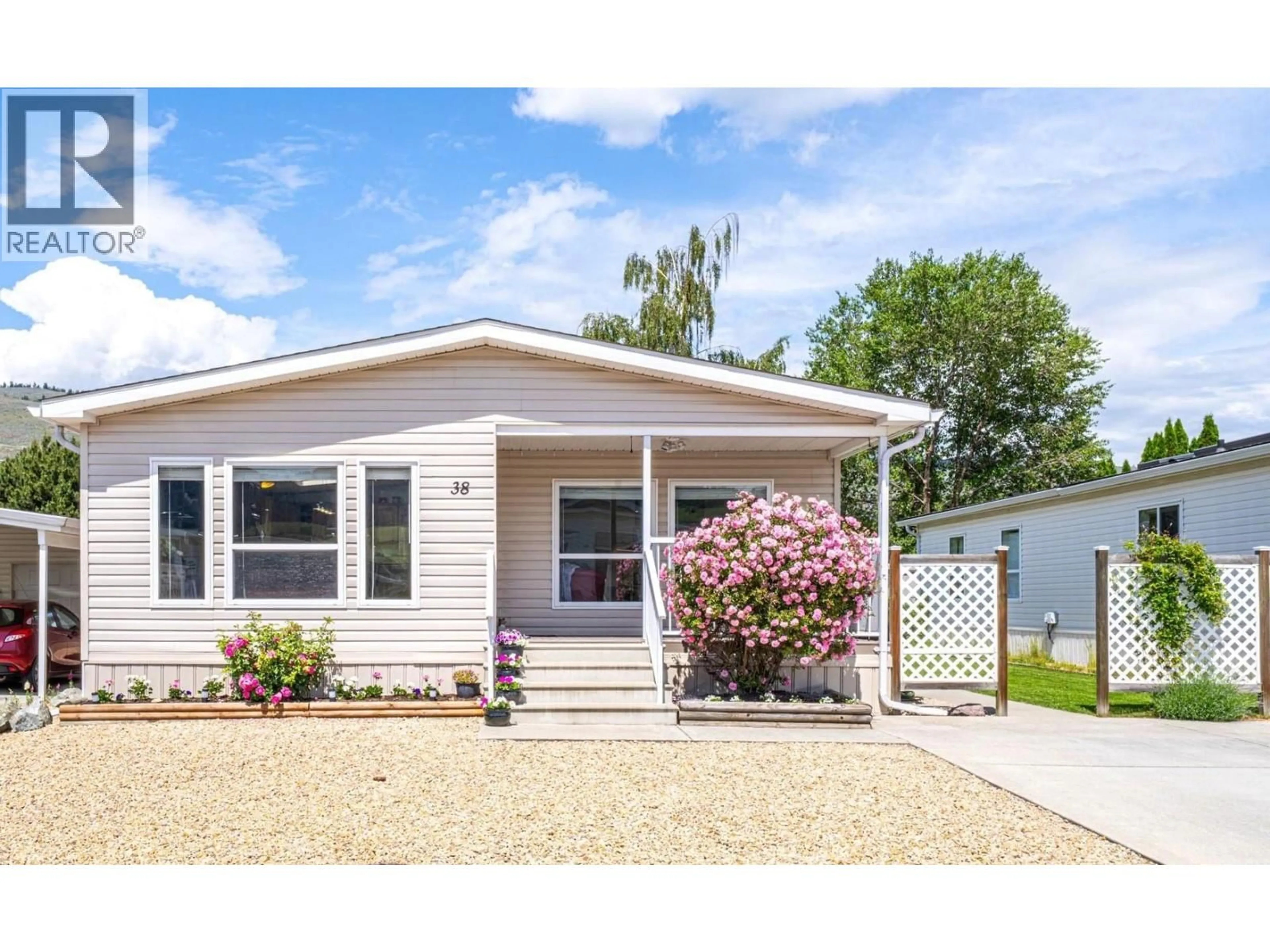 Home with vinyl exterior material, street for 38 - 6688 TRONSON ROAD, Vernon British Columbia V1H1R9