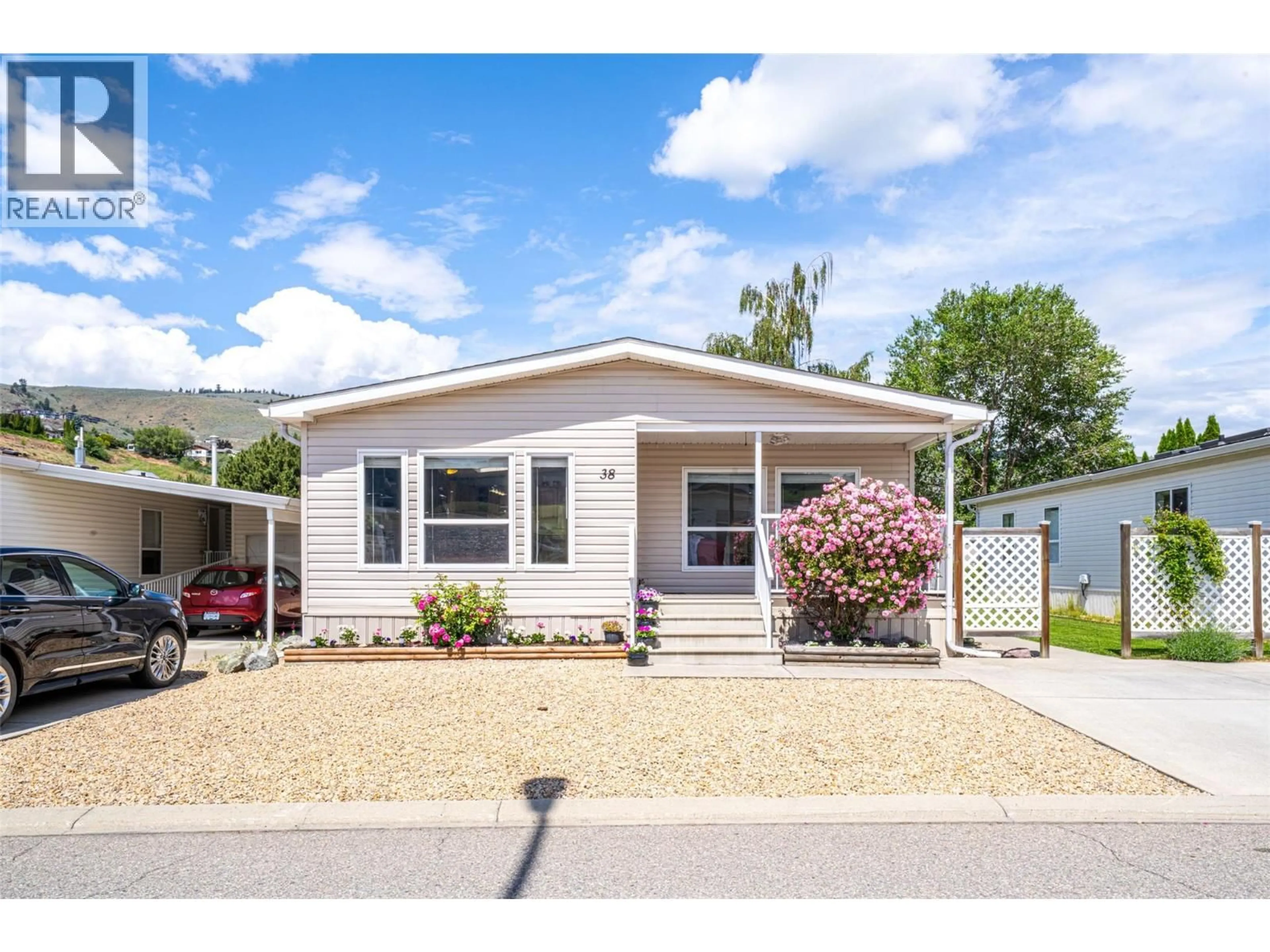 Home with vinyl exterior material, street for 38 - 6688 TRONSON ROAD, Vernon British Columbia V1H1R9