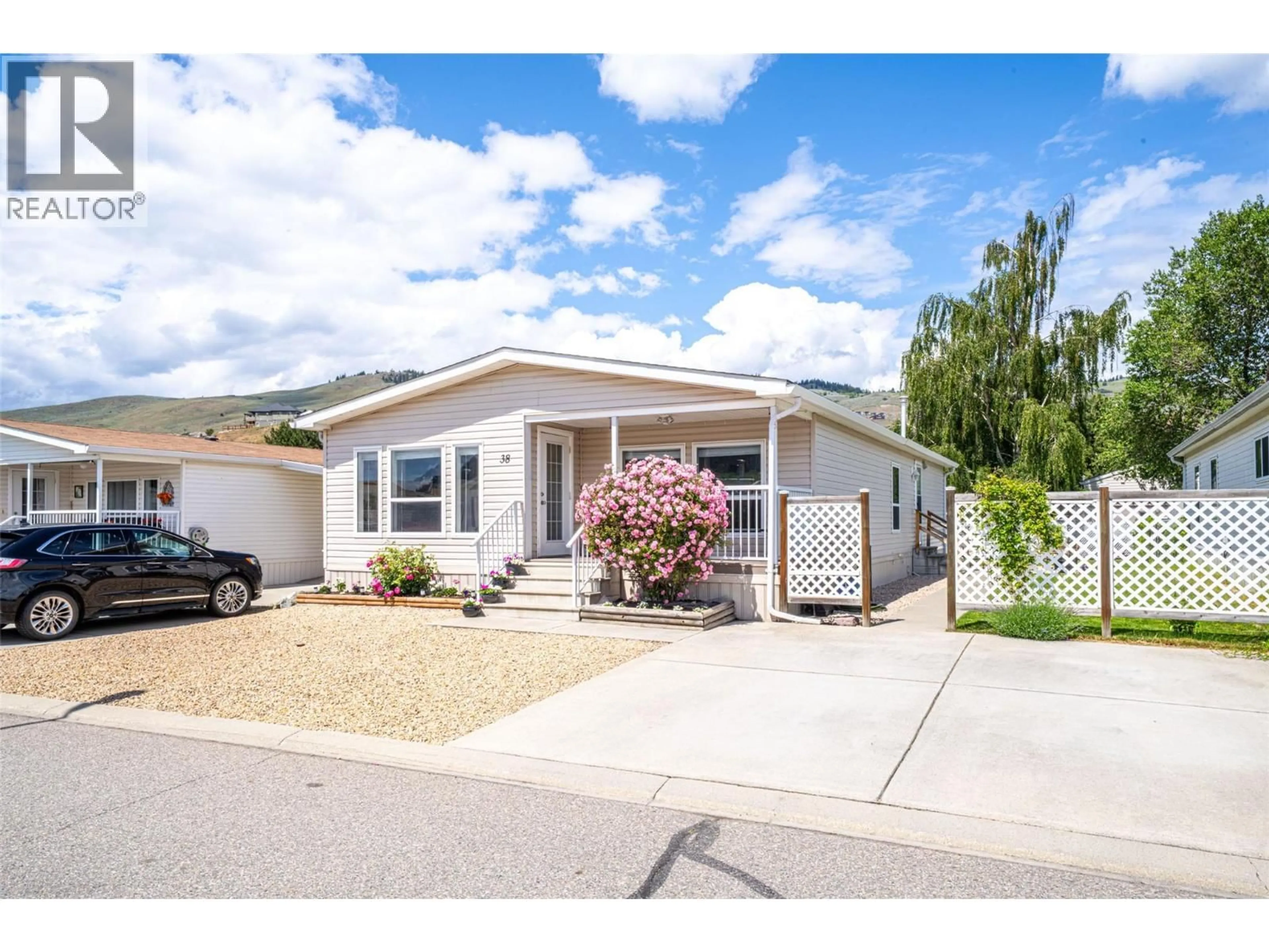 Home with vinyl exterior material, street for 38 - 6688 TRONSON ROAD, Vernon British Columbia V1H1R9
