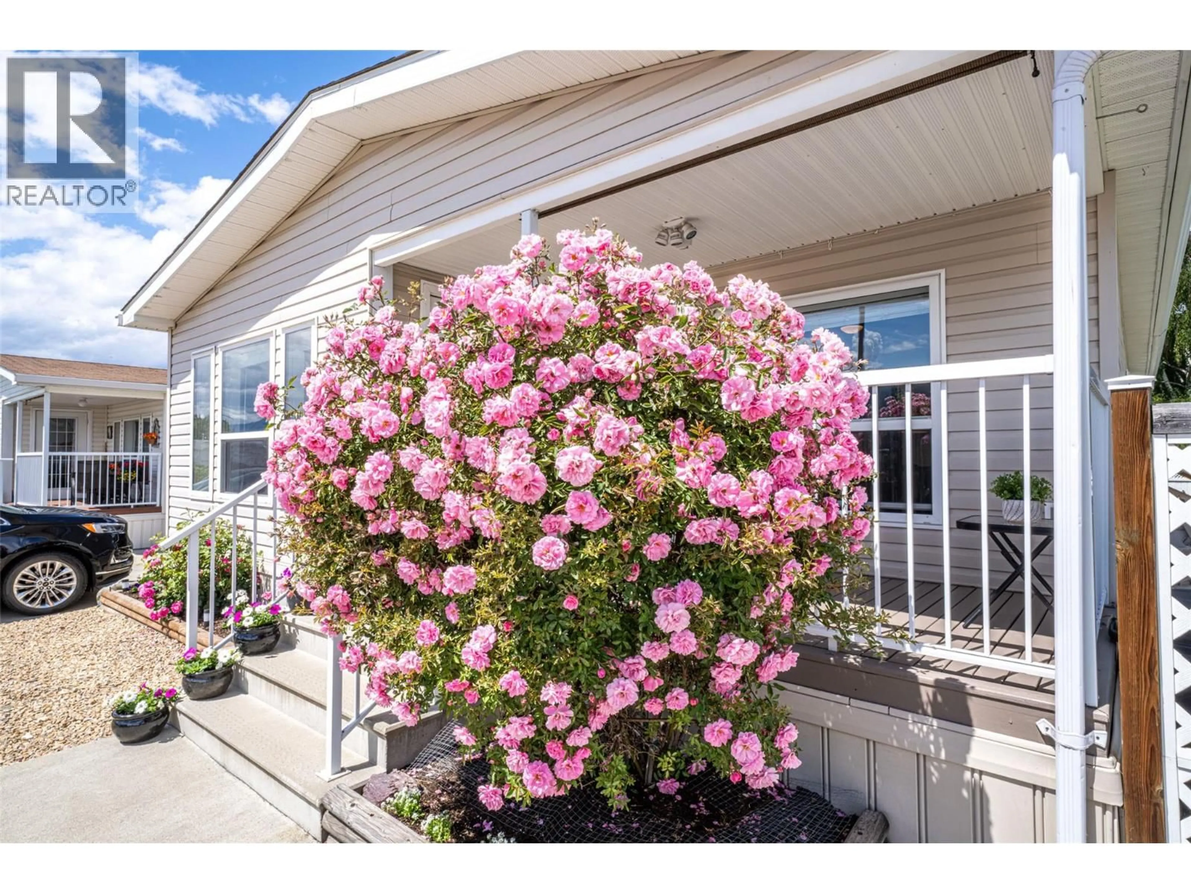 Home with vinyl exterior material, street for 38 - 6688 TRONSON ROAD, Vernon British Columbia V1H1R9