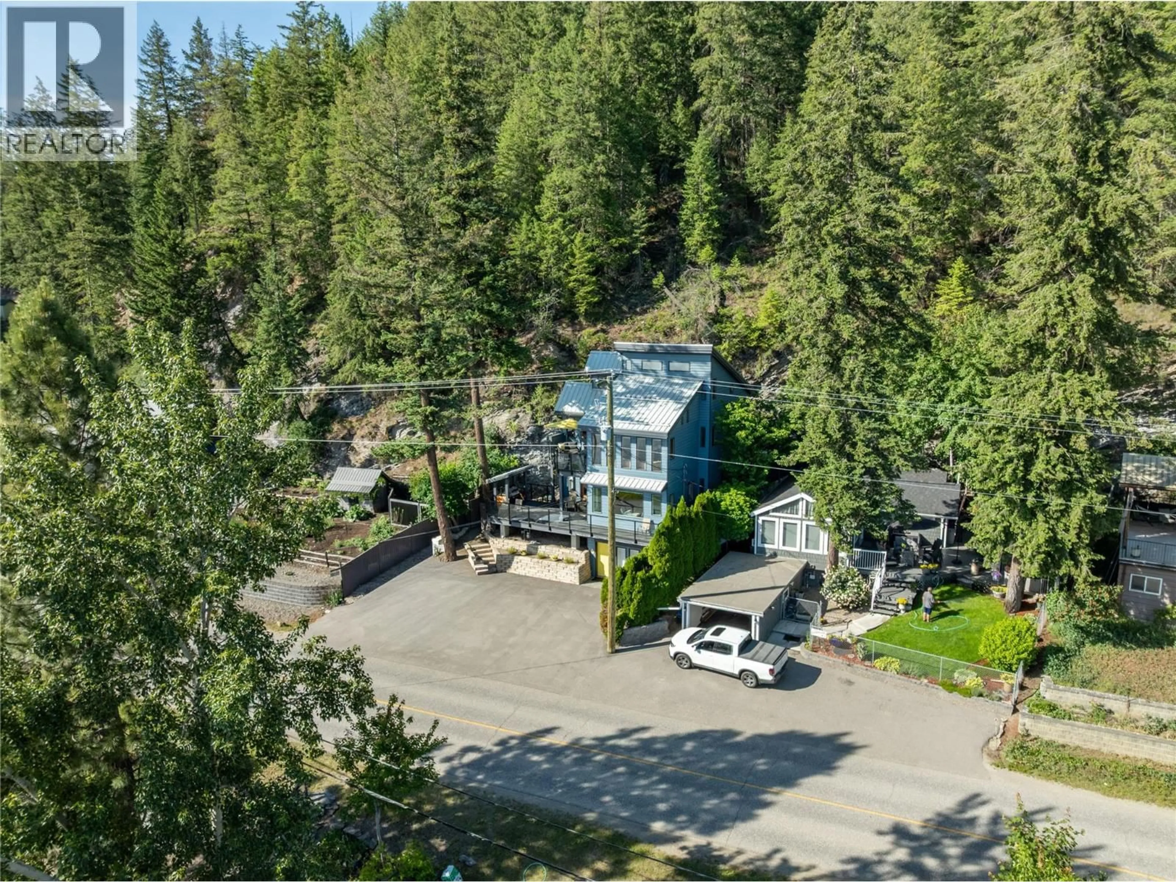 A pic from outside/outdoor area/front of a property/back of a property/a pic from drone, forest/trees view for 2306 EAGLE BAY ROAD, Blind Bay British Columbia V0E1H1