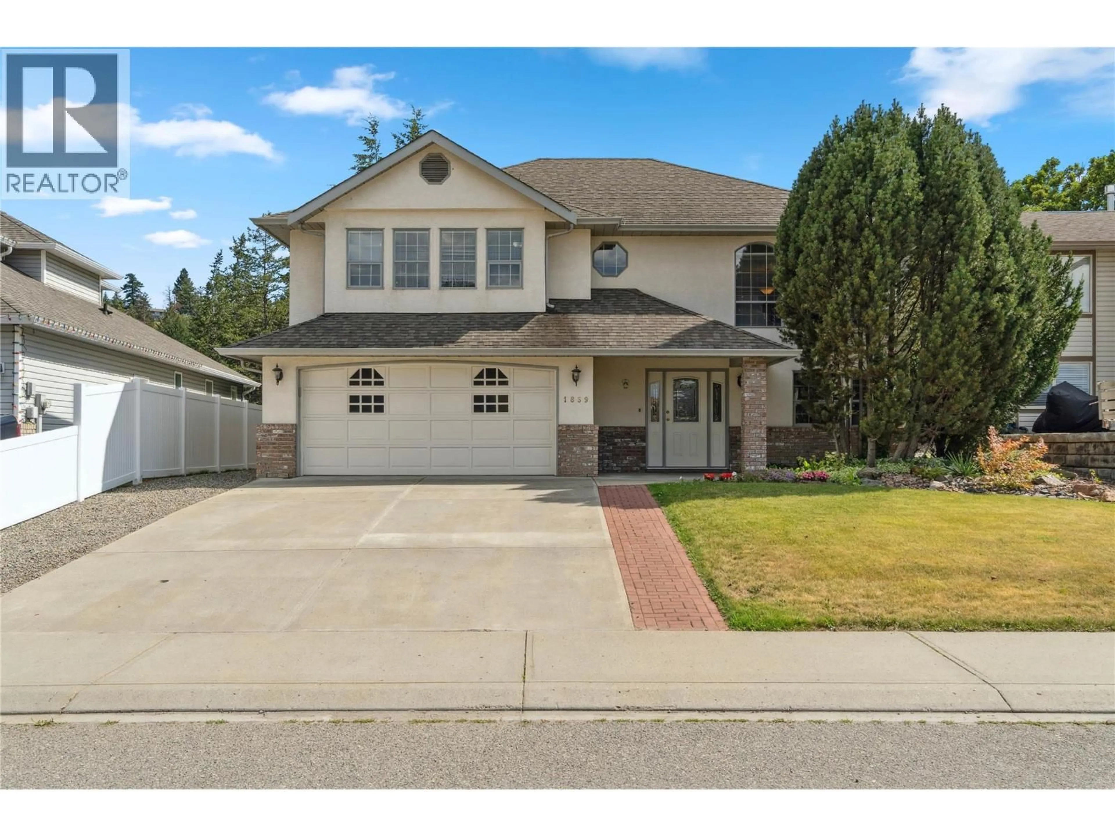 Home with vinyl exterior material, street for 1869 MCKINLEY COURT, Kamloops British Columbia V2E2L9