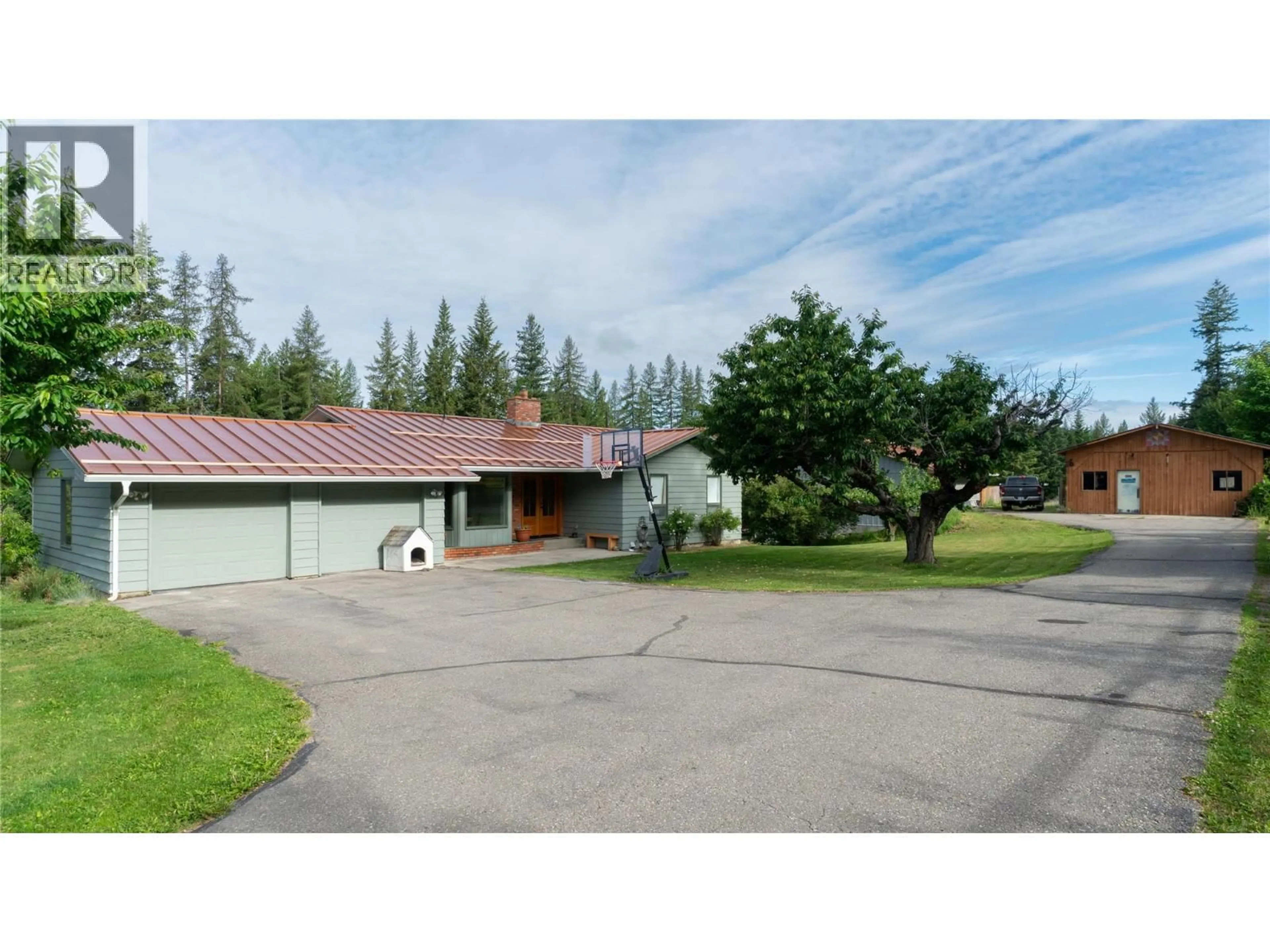 A pic from outside/outdoor area/front of a property/back of a property/a pic from drone, street for 5851 20 AVENUE NORTHEAST, Salmon Arm British Columbia V1E1Y4