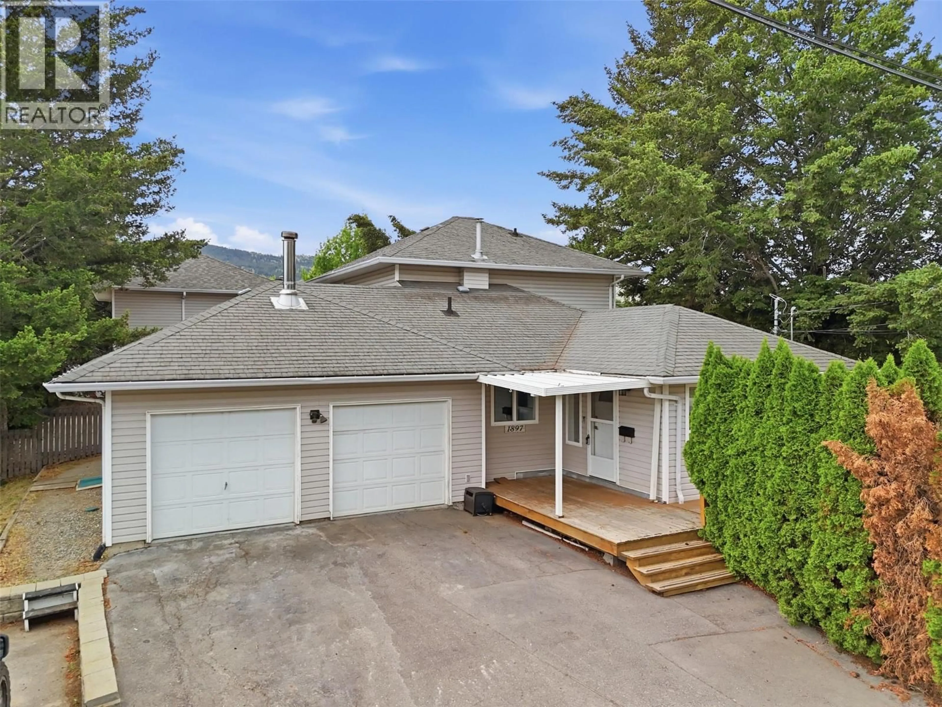 A pic from outside/outdoor area/front of a property/back of a property/a pic from drone, mountain view for 1897 FLEETWOOD AVENUE, Kamloops British Columbia V2B4R9