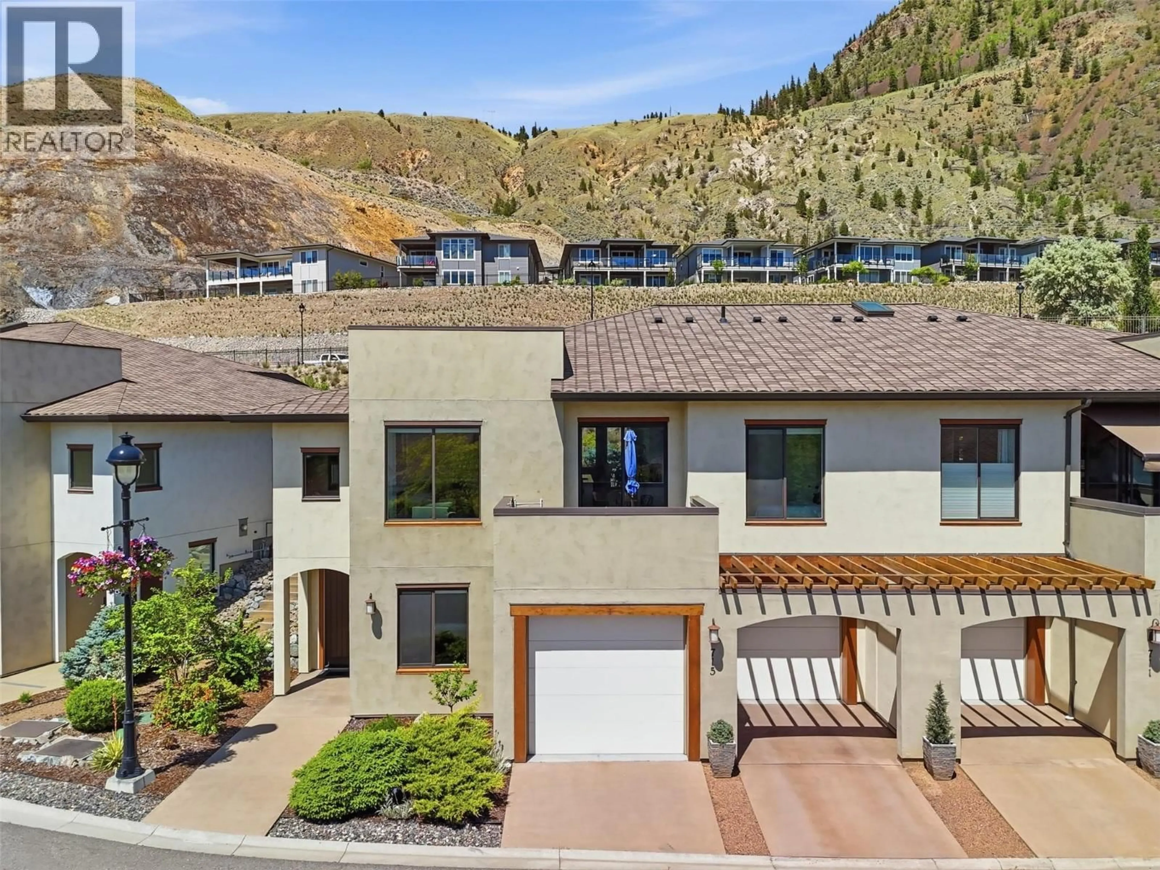 A pic from outside/outdoor area/front of a property/back of a property/a pic from drone, mountain view for 715 BELMONTE TERRACE, Kamloops British Columbia V2H0C6