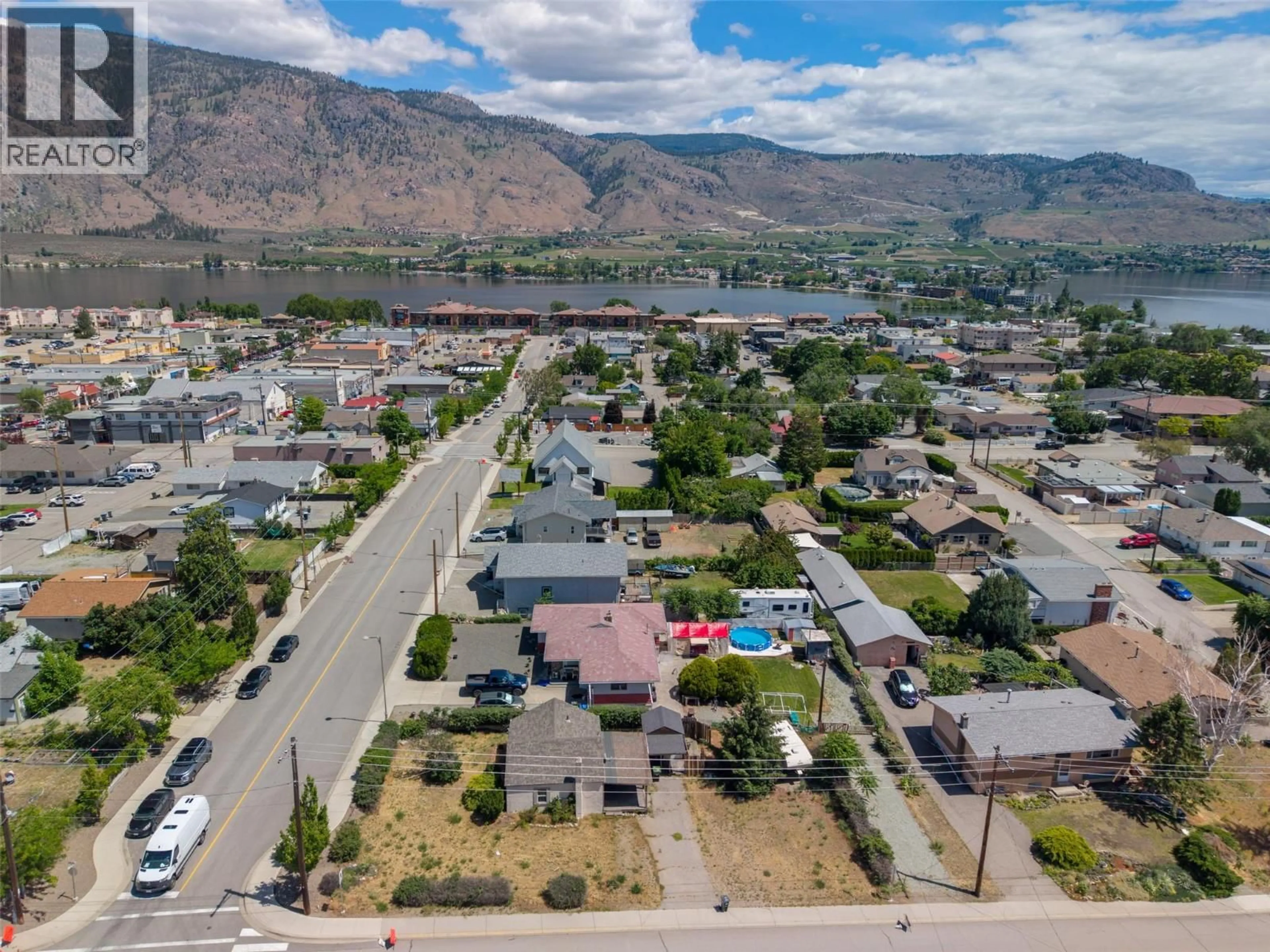 A pic from outside/outdoor area/front of a property/back of a property/a pic from drone, mountain view for 8709 74TH AVENUE, Osoyoos British Columbia V0H1V0
