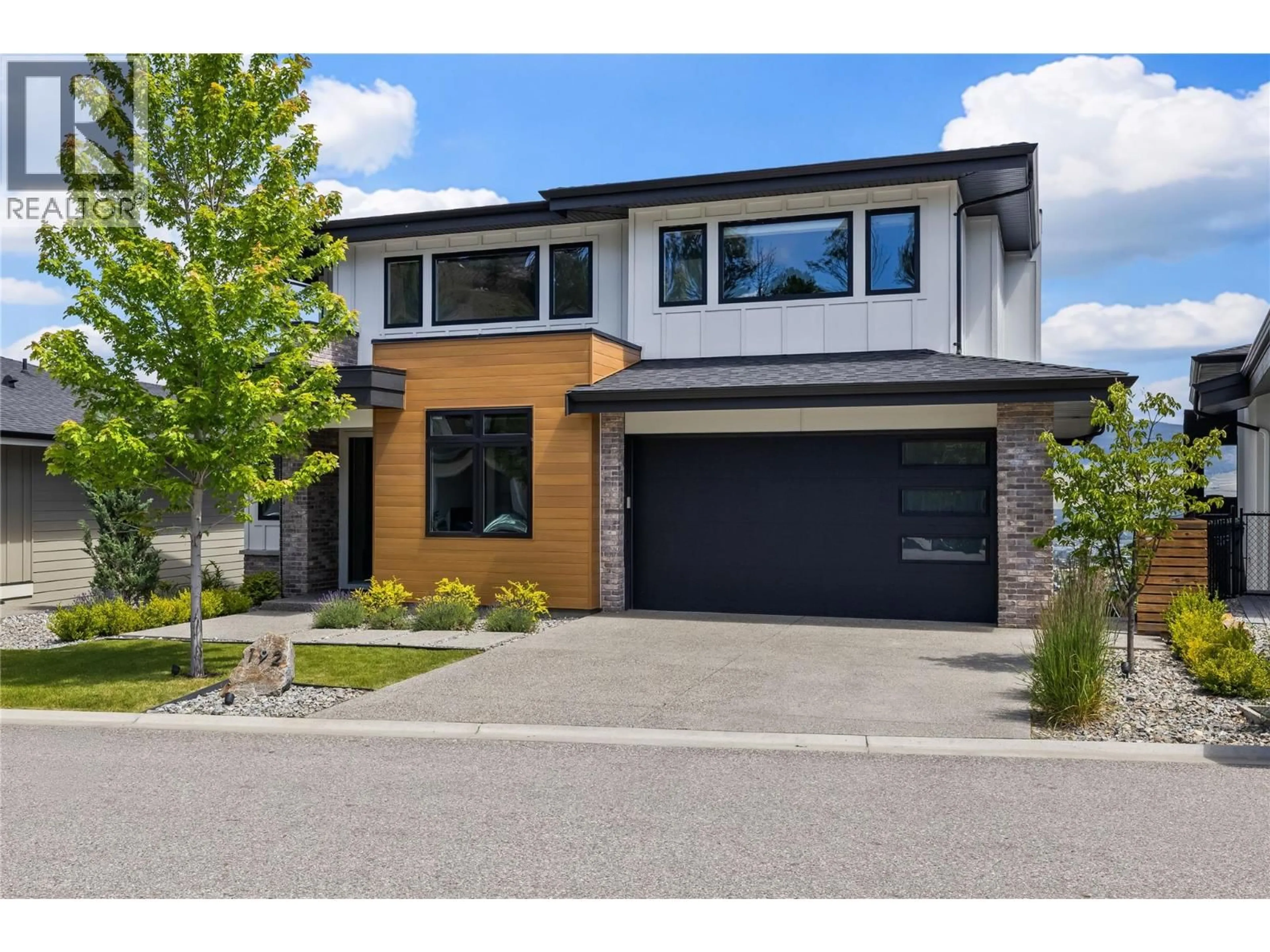 Home with brick exterior material, street for 192 SUMMER WOOD DRIVE, Kelowna British Columbia V1V0C9