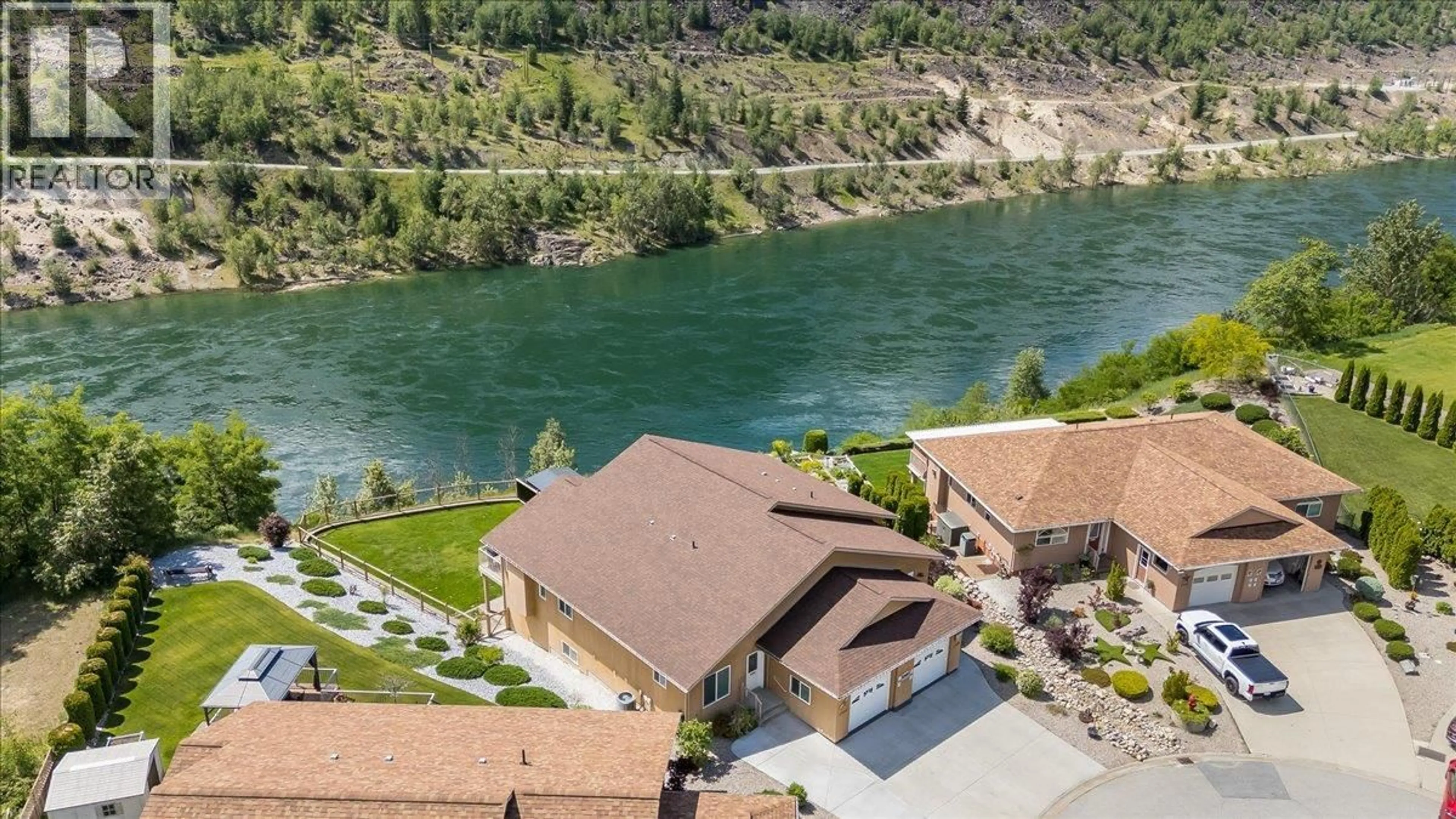 A pic from outside/outdoor area/front of a property/back of a property/a pic from drone, water/lake/river/ocean view for 1214 HEATHER PLACE, Trail British Columbia V1R4Y2