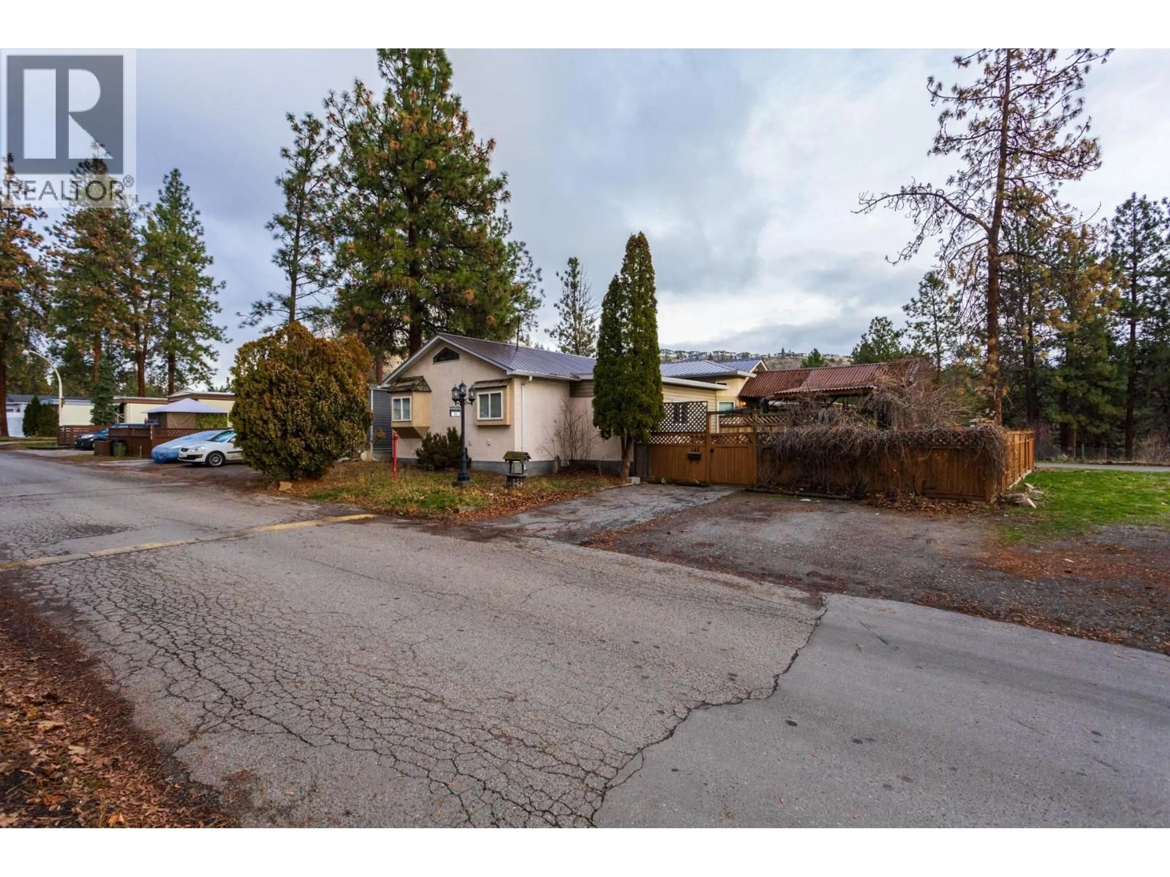 A pic from outside/outdoor area/front of a property/back of a property/a pic from drone, street for 145 - 1999 HIGHWAY 97 OTHER SOUTH, West Kelowna British Columbia V1Z1B2