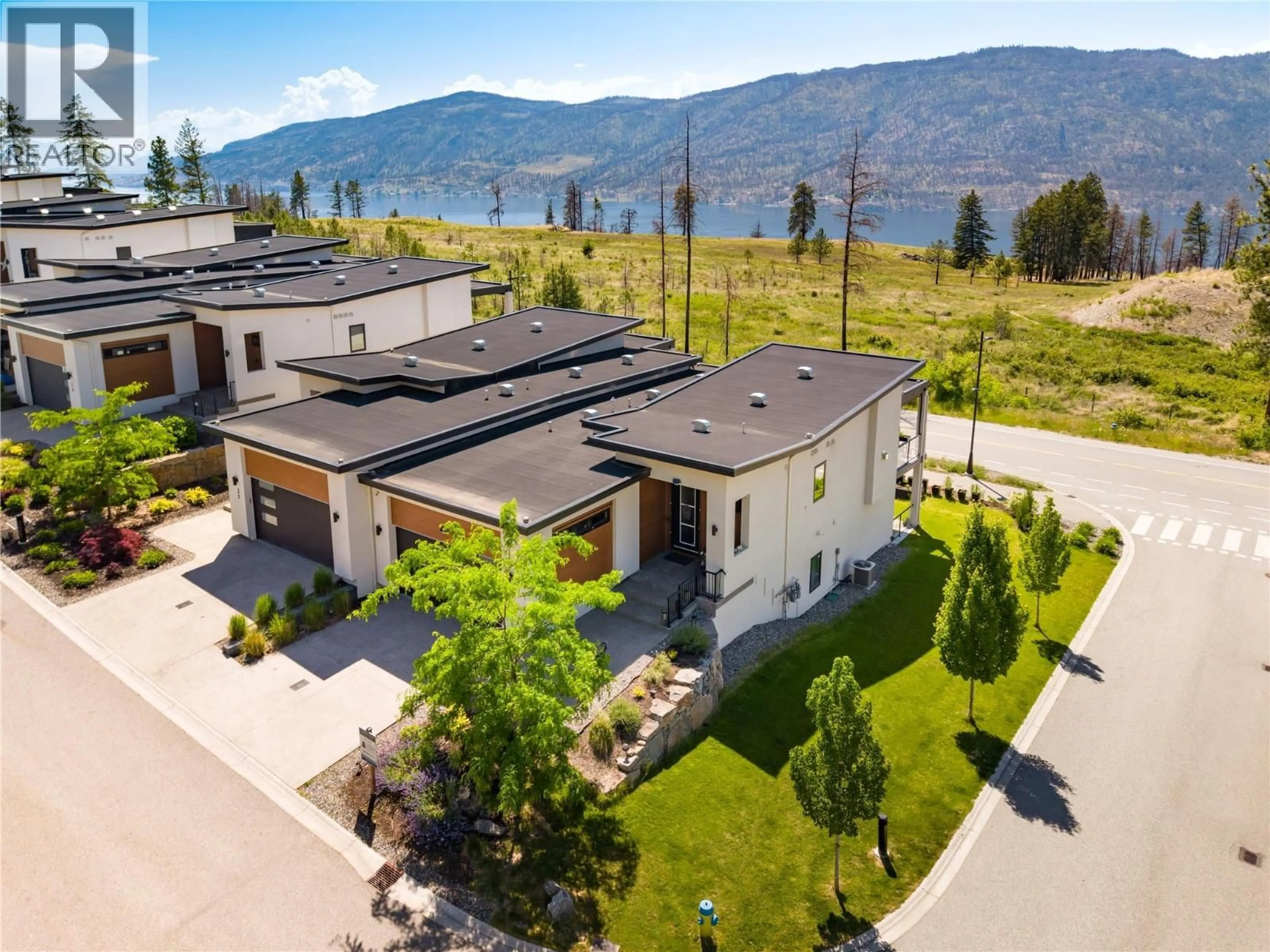 A pic from outside/outdoor area/front of a property/back of a property/a pic from drone, mountain view for 28 - 10100 TYNDALL ROAD, Lake Country British Columbia V4V0A9