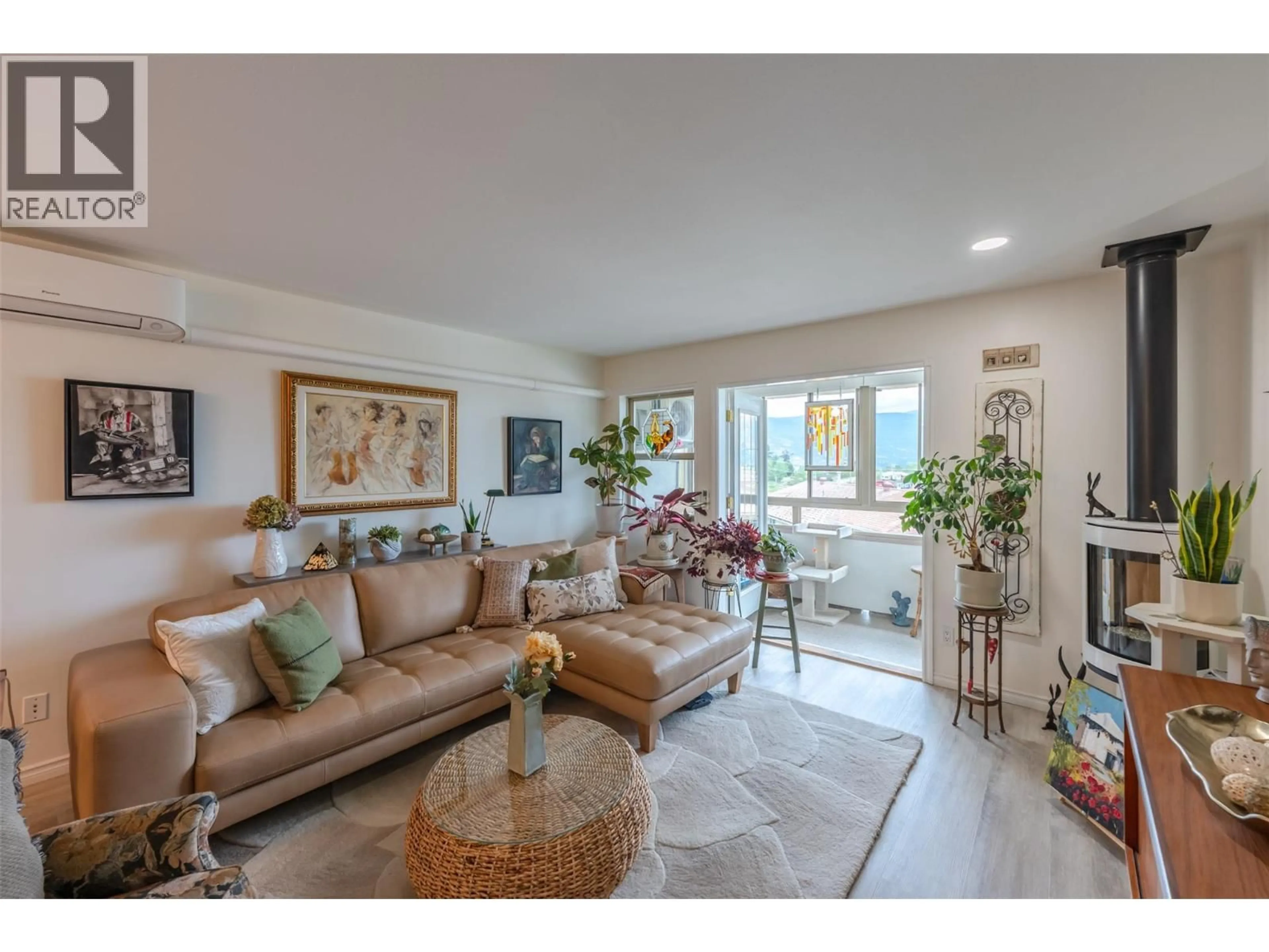 Living room with furniture, unknown for 203 - 8416 JUBILEE ROAD, Summerland British Columbia V0H1Z5