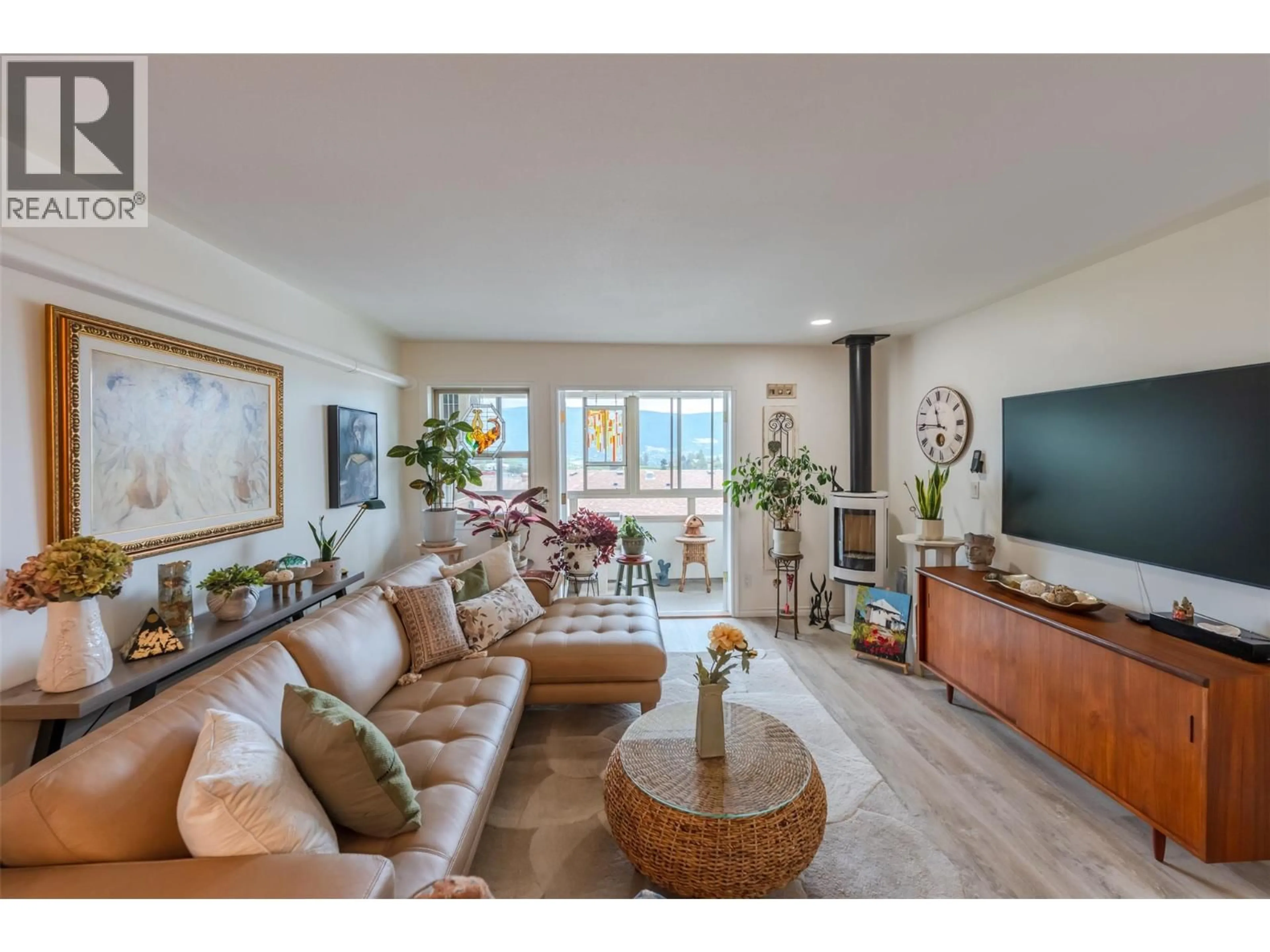 Living room with furniture, unknown for 203 - 8416 JUBILEE ROAD, Summerland British Columbia V0H1Z5