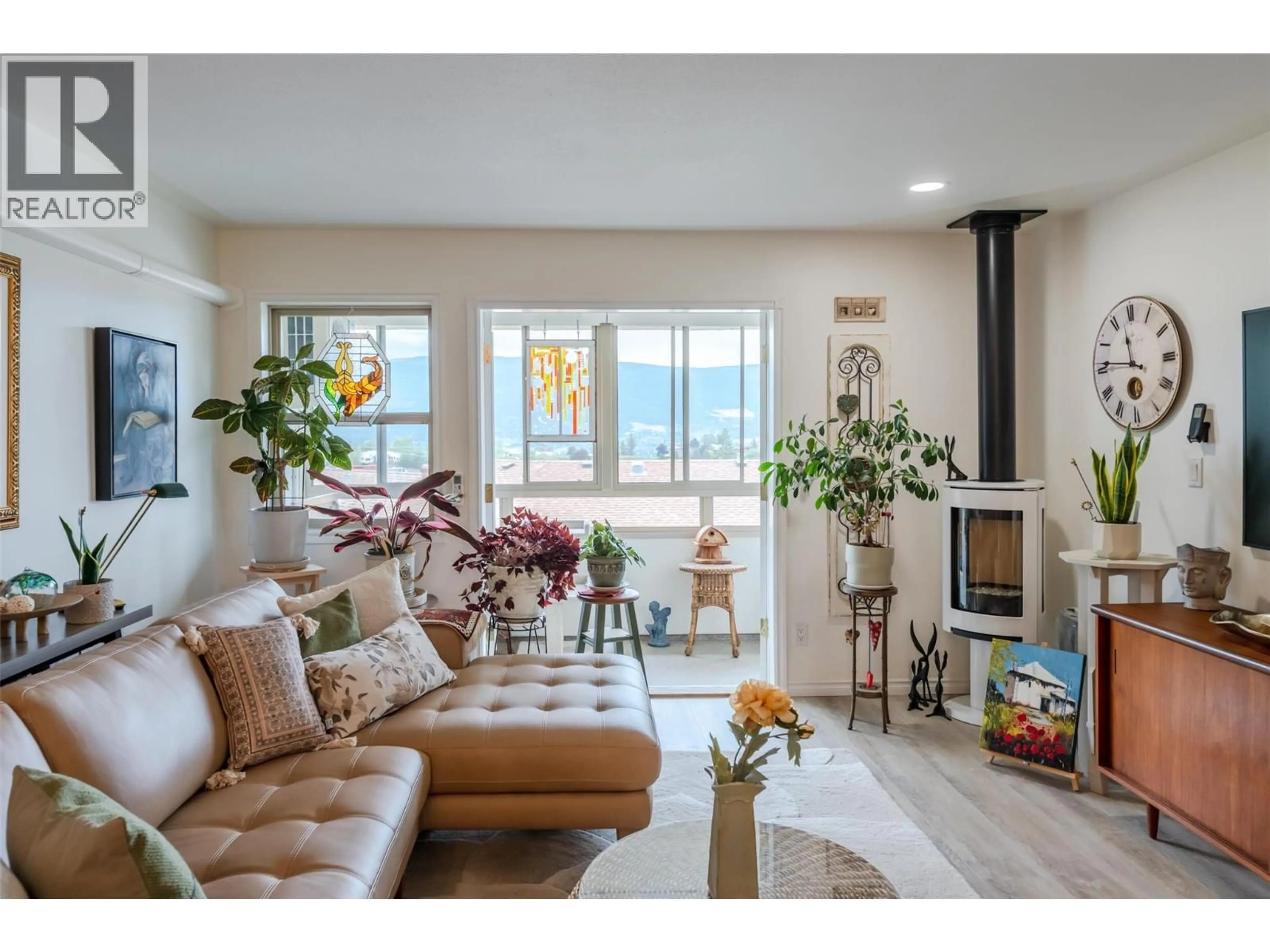 Living room with furniture, ceramic/tile floor for 203 - 8416 JUBILEE ROAD, Summerland British Columbia V0H1Z5