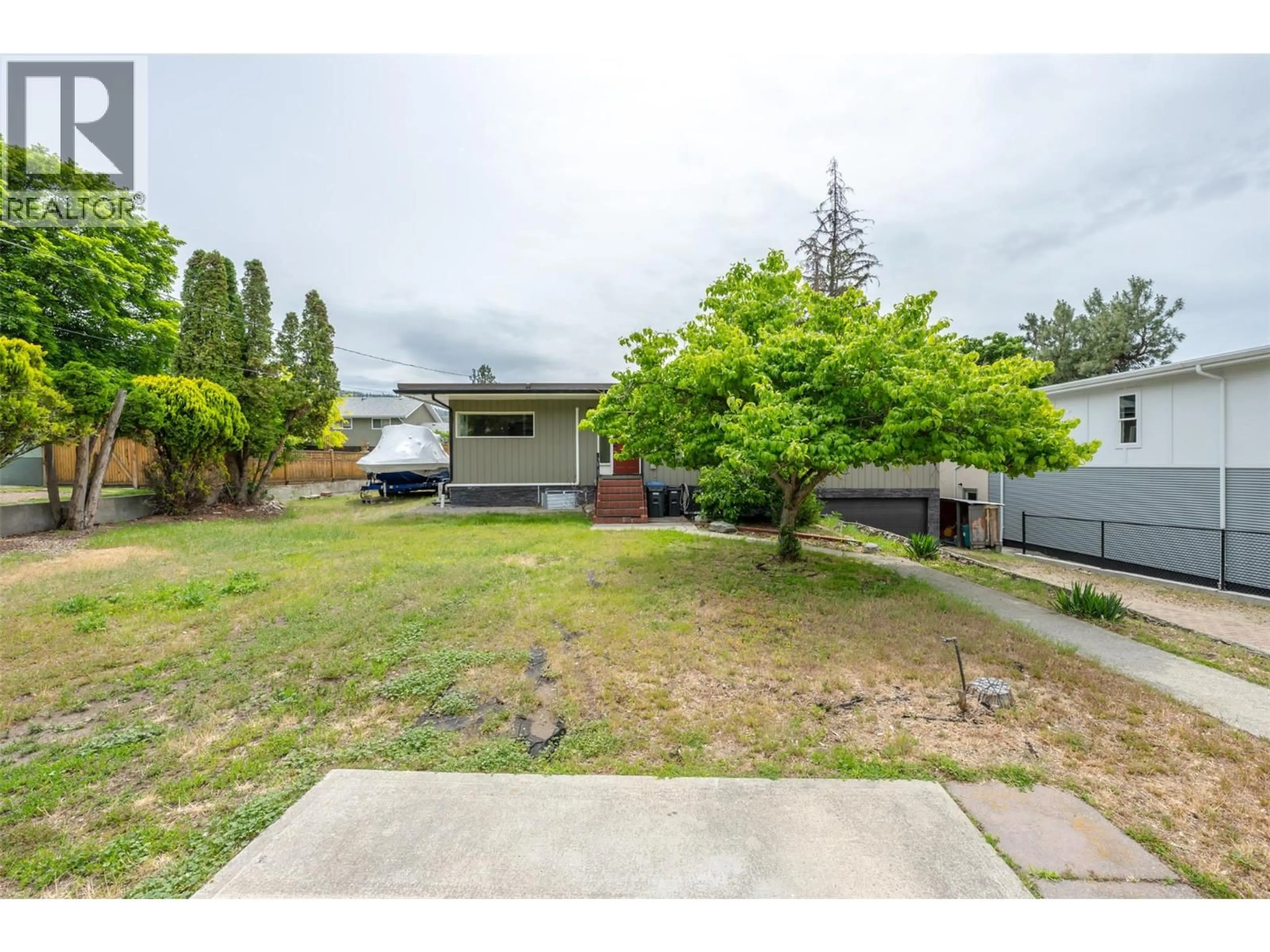 A pic from outside/outdoor area/front of a property/back of a property/a pic from drone, street for 1322 RIDGEDALE AVENUE, Penticton British Columbia V2A2S2