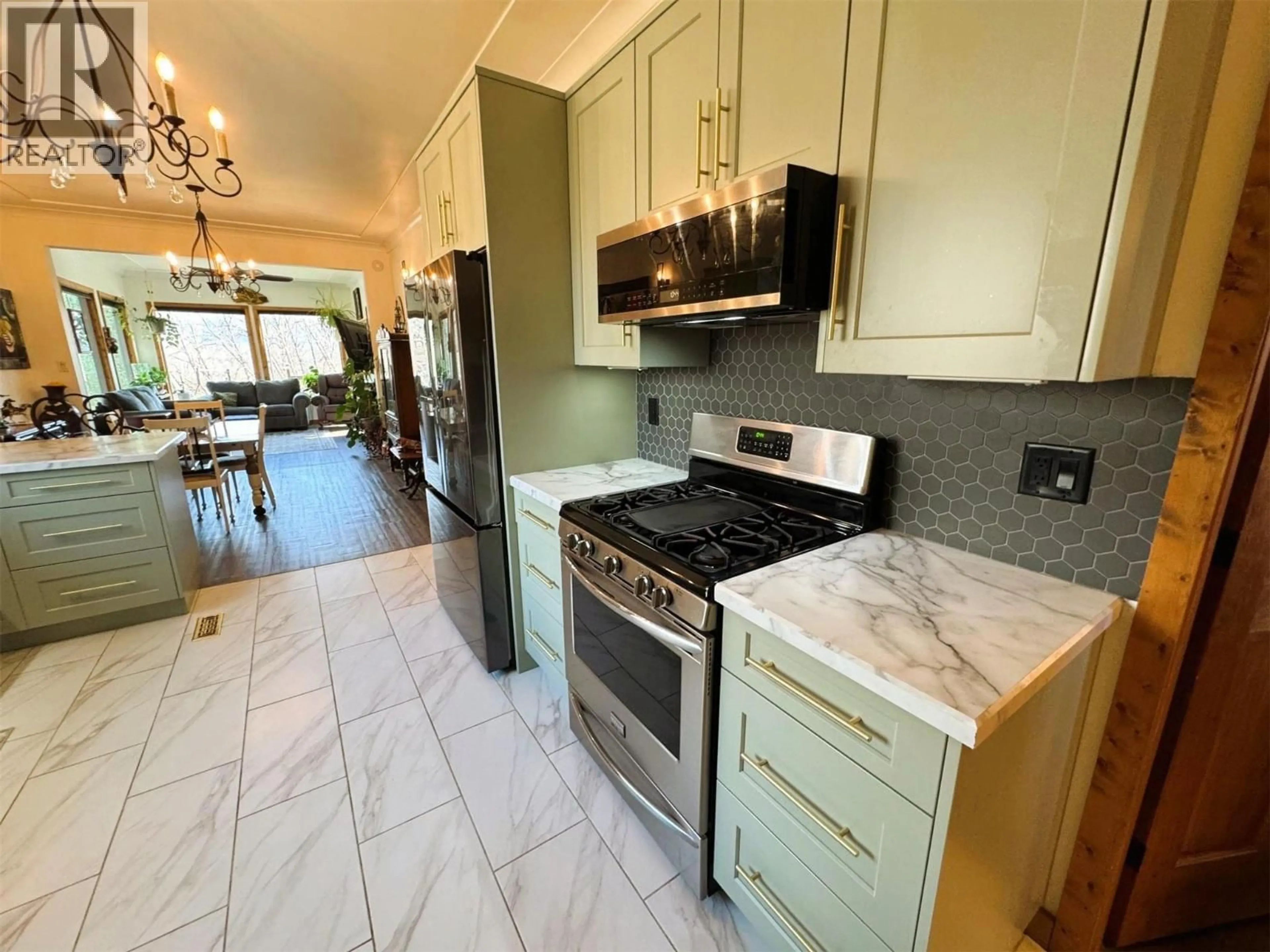 Open concept kitchen, ceramic/tile floor for 2200 ALMOND GARDENS ROAD, Grand Forks British Columbia V0H1H4