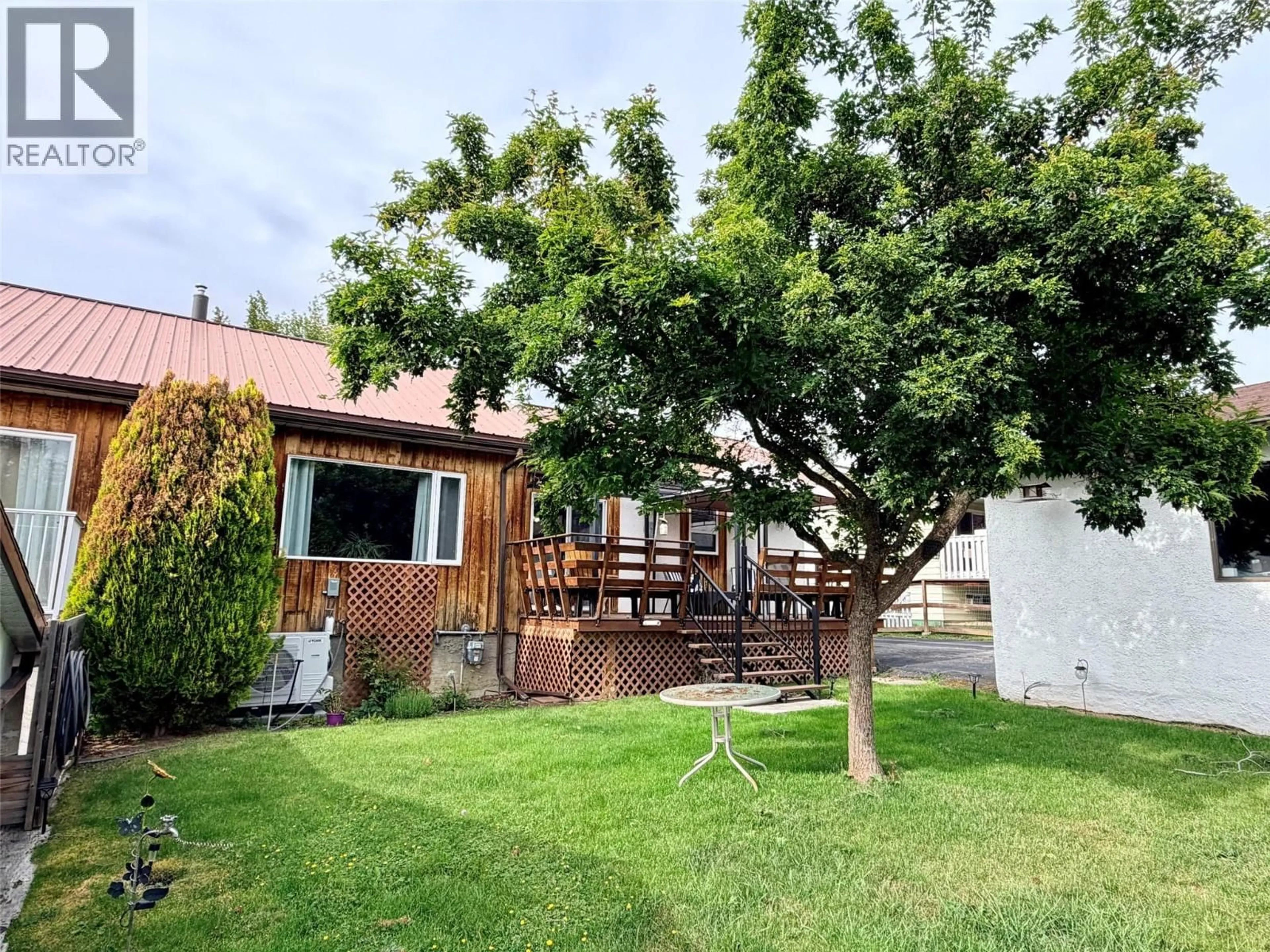 A pic from outside/outdoor area/front of a property/back of a property/a pic from drone, unknown for 1105 BIRCH STREET, Creston British Columbia V0B1G3