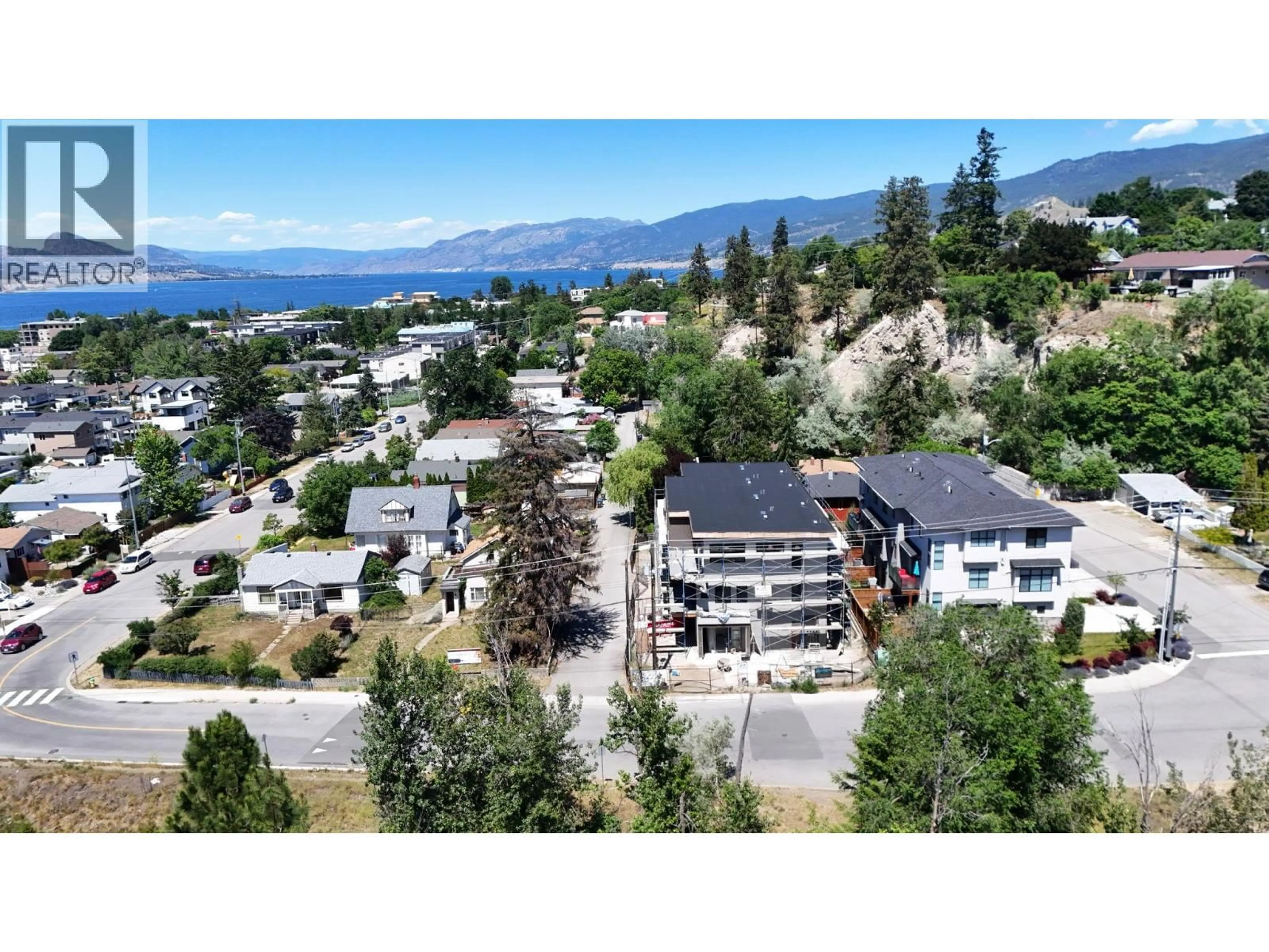 A pic from outside/outdoor area/front of a property/back of a property/a pic from drone, mountain view for 101 - 463 WADE AVENUE, Penticton British Columbia V2A1T1