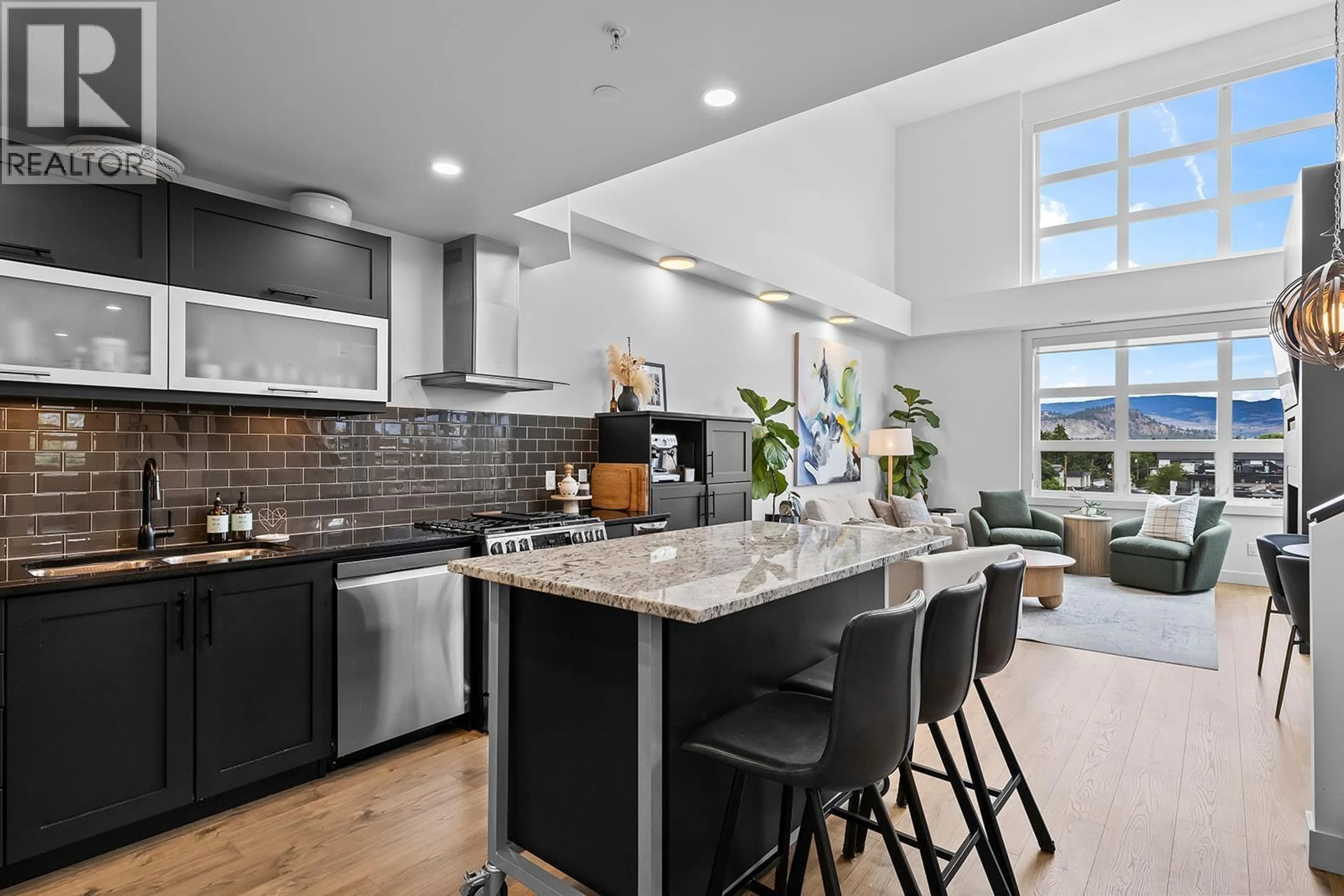 Open concept kitchen, ceramic/tile floor for 407 - 700 MARTIN AVENUE, Kelowna British Columbia V1Y6V3