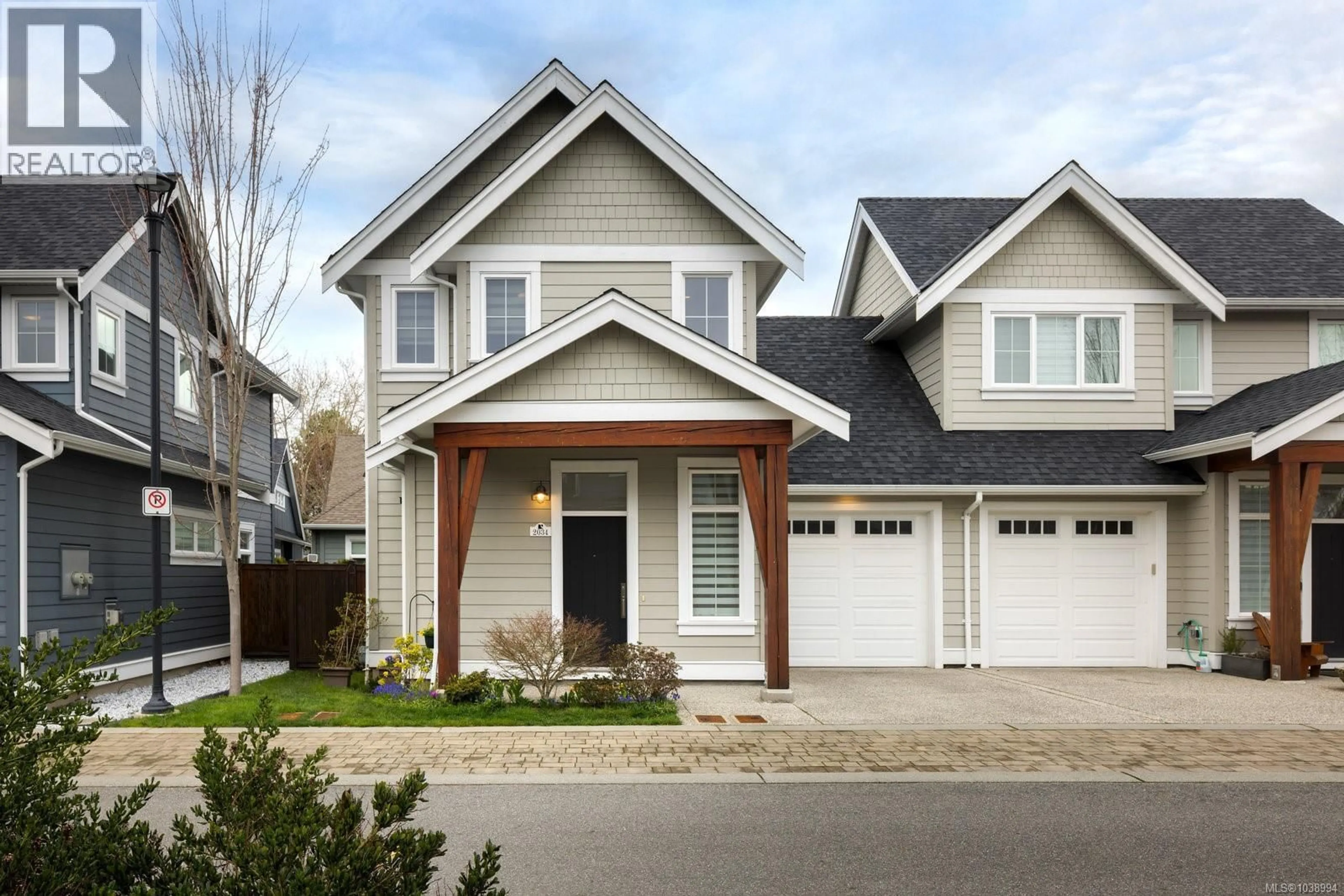 Home with vinyl exterior material, street for 2034 SEAWIND WAY, Sidney British Columbia V8L0C4