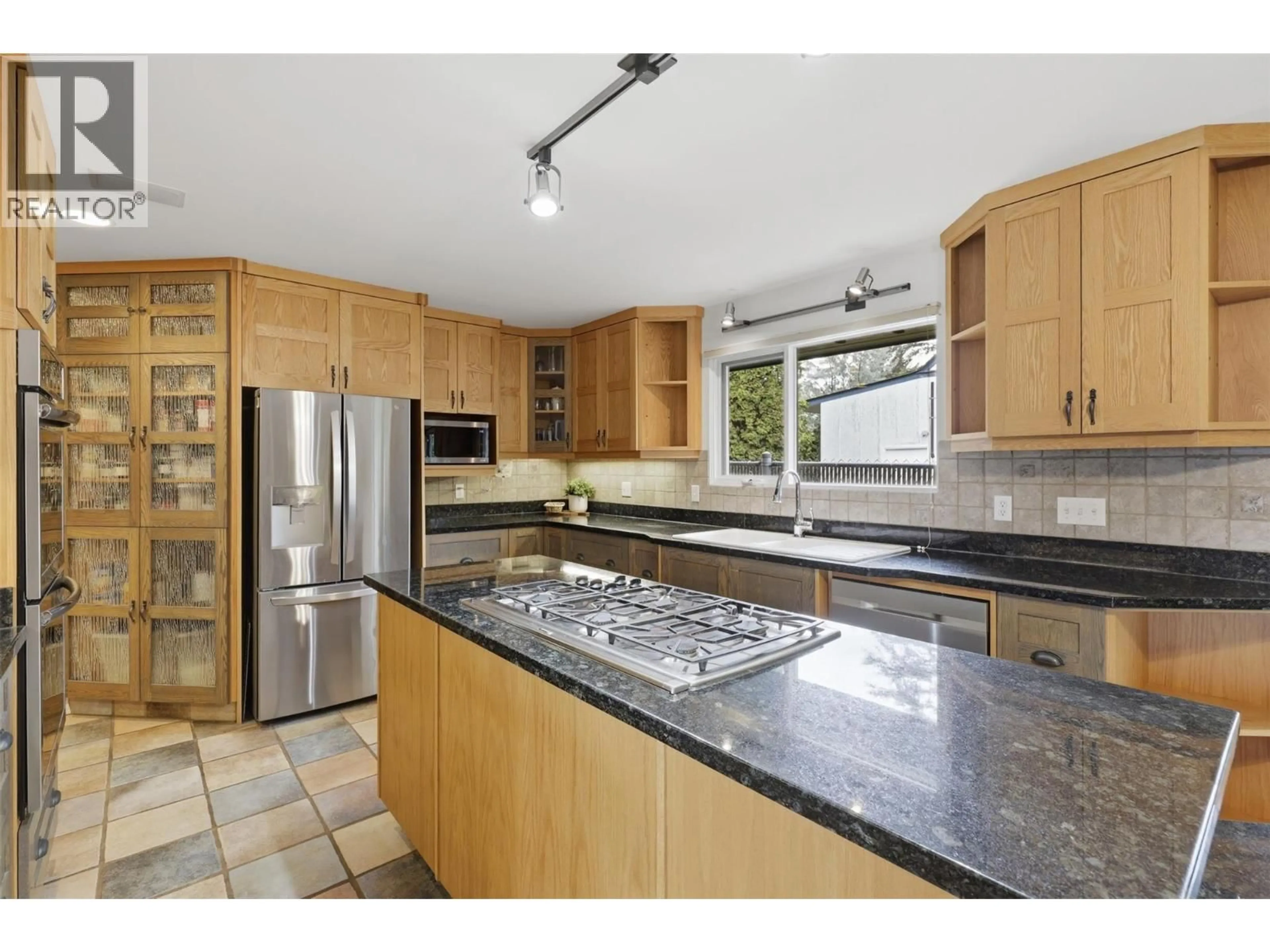 Open concept kitchen, ceramic/tile floor for 2245 CRESCENT DRIVE, Kamloops British Columbia V2C4S7