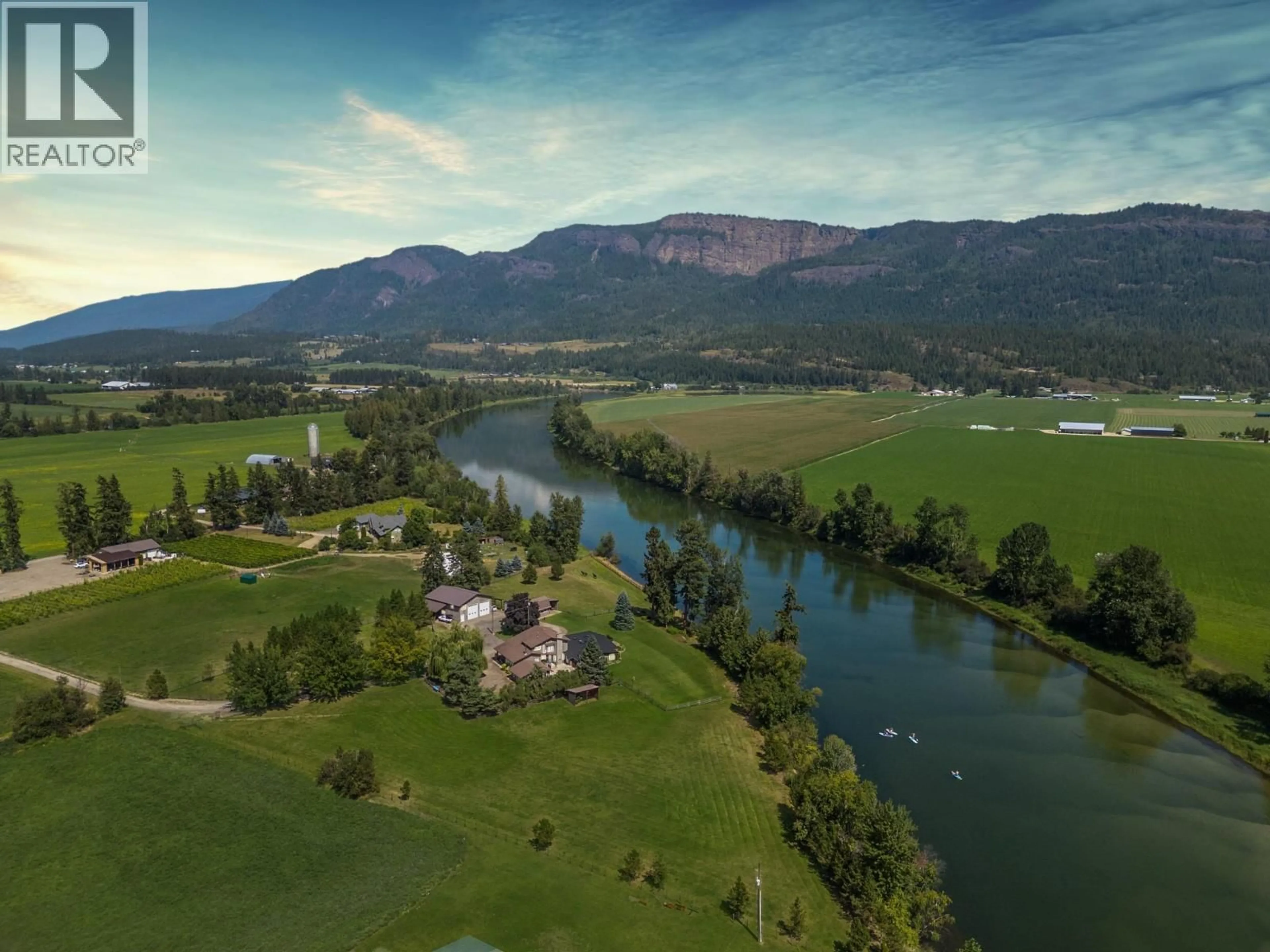 A pic from outside/outdoor area/front of a property/back of a property/a pic from drone, water/lake/river/ocean view for 48 WATERSIDE ROAD, Enderby British Columbia V4Y4G5
