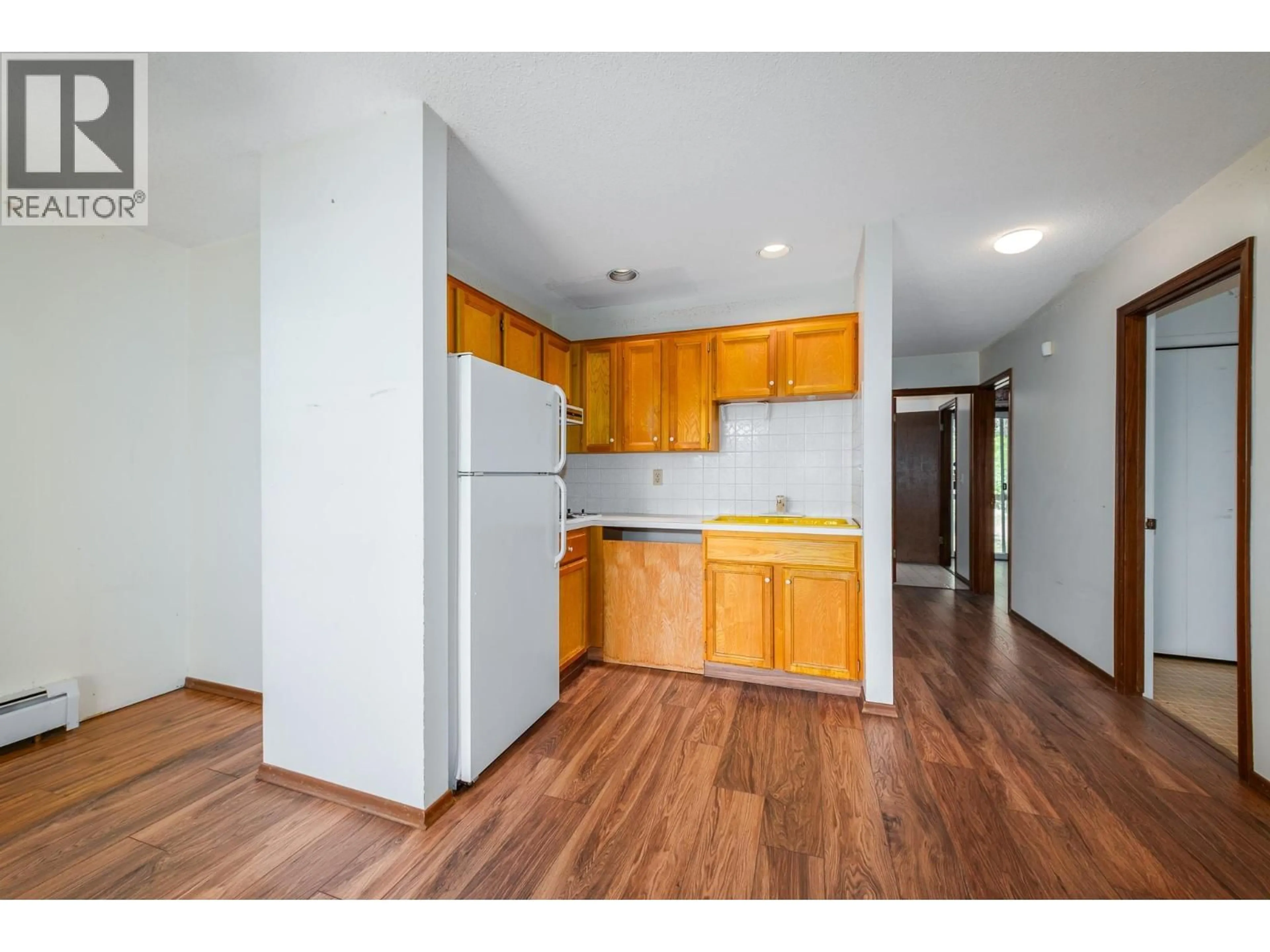 Standard kitchen, wood/laminate floor for 1183 TREVOR DRIVE, West Kelowna British Columbia V1Z3K7