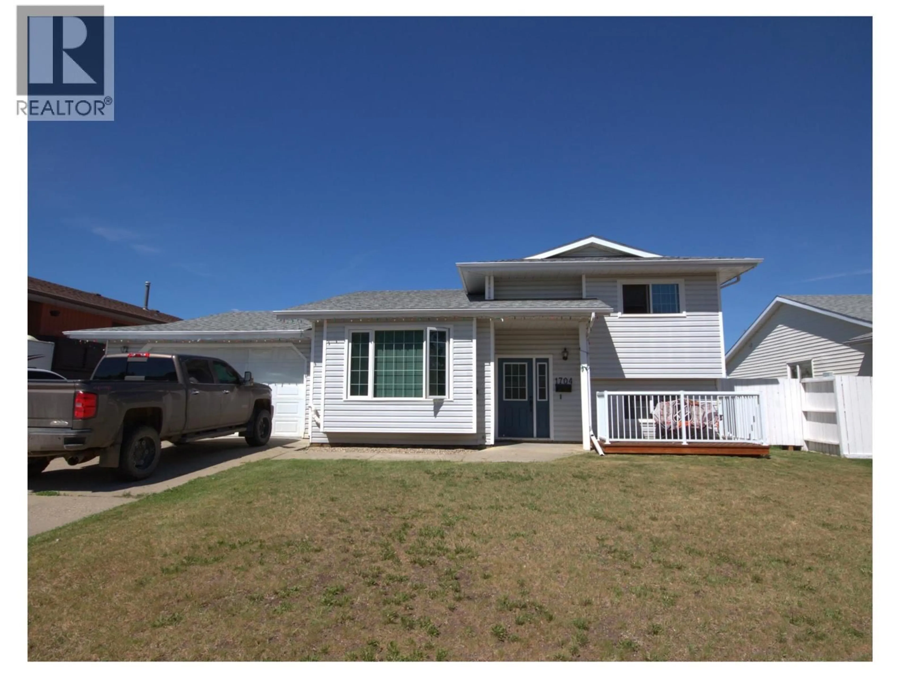 Home with vinyl exterior material, street for 1704 CEDARWOOD COURT, Dawson Creek British Columbia V1G4L8