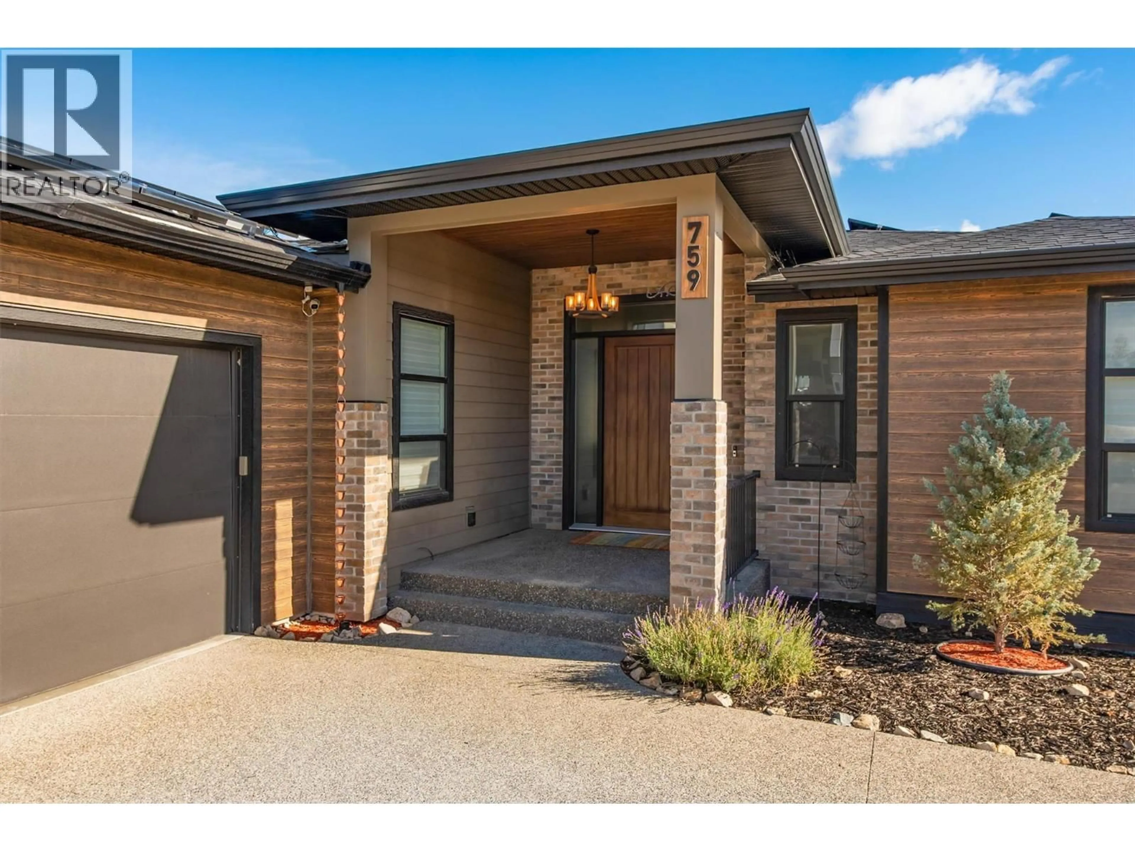 Home with brick exterior material, street for 759 CARNOUSTIE DRIVE, Kelowna British Columbia V1P1V2