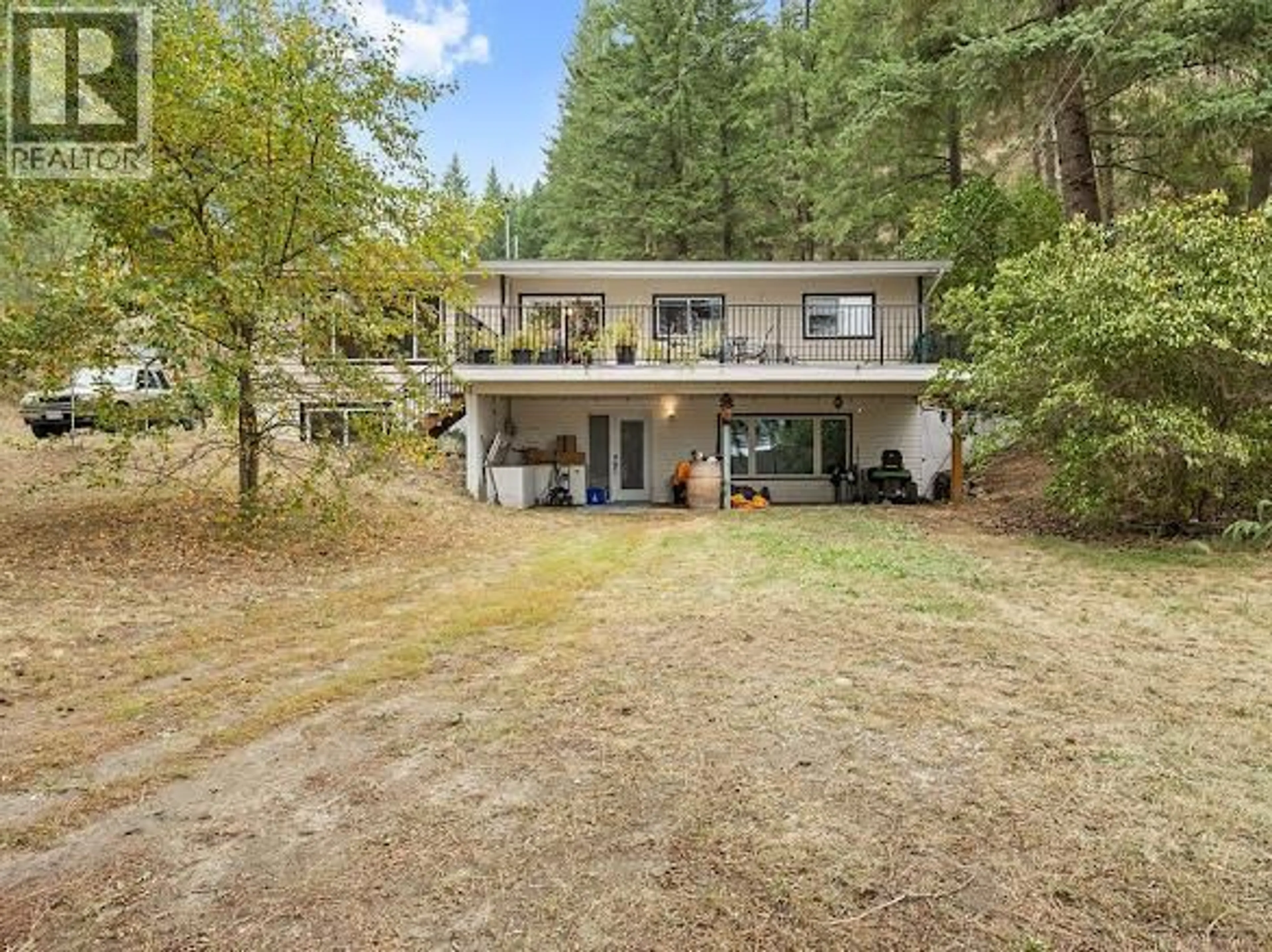 A pic from outside/outdoor area/front of a property/back of a property/a pic from drone, forest/trees view for 2429 SALMON RIVER ROAD, Salmon Arm British Columbia V1E4M1