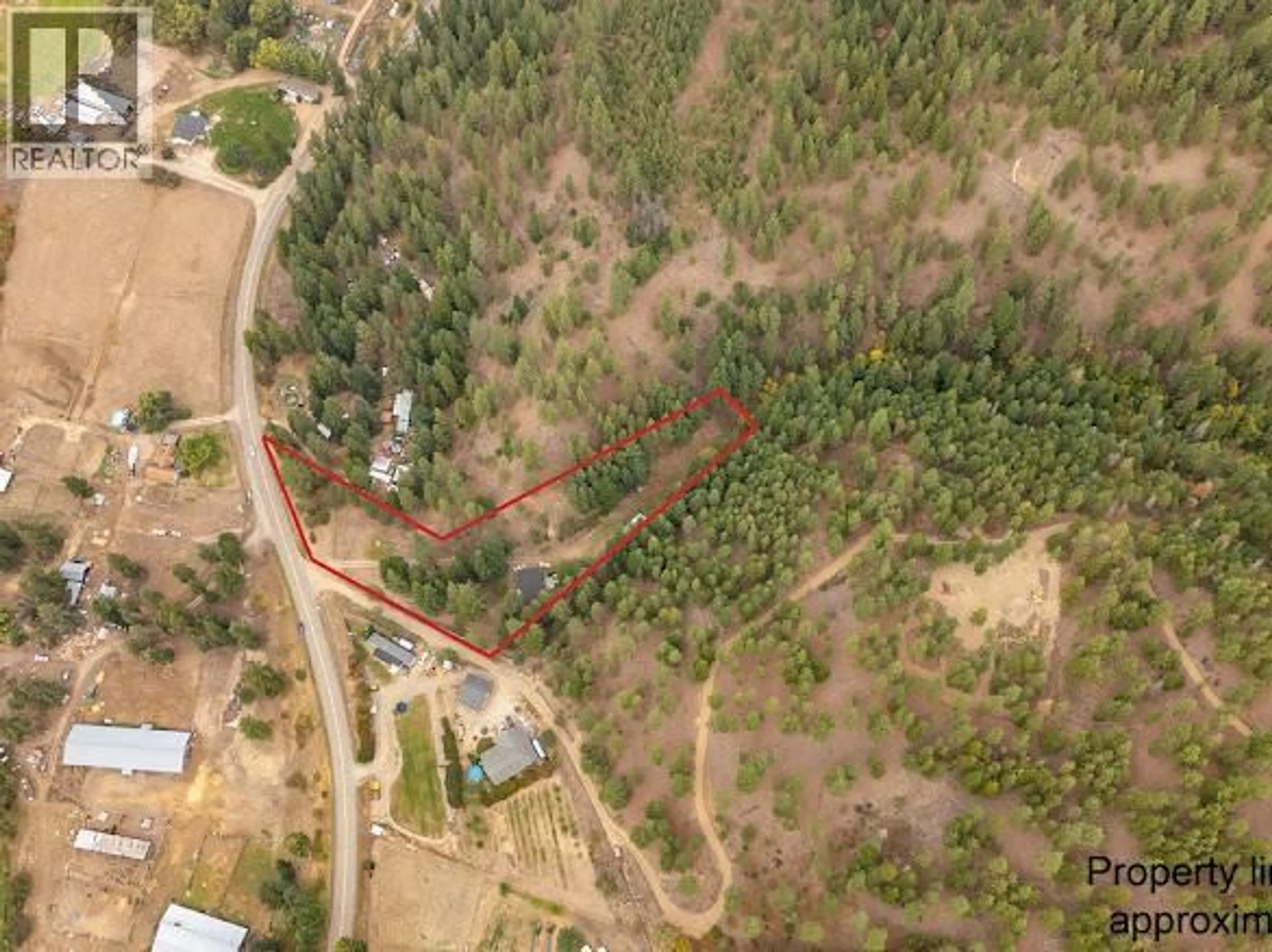 A pic from outside/outdoor area/front of a property/back of a property/a pic from drone, forest/trees view for 2429 SALMON RIVER ROAD, Salmon Arm British Columbia V1E4M1