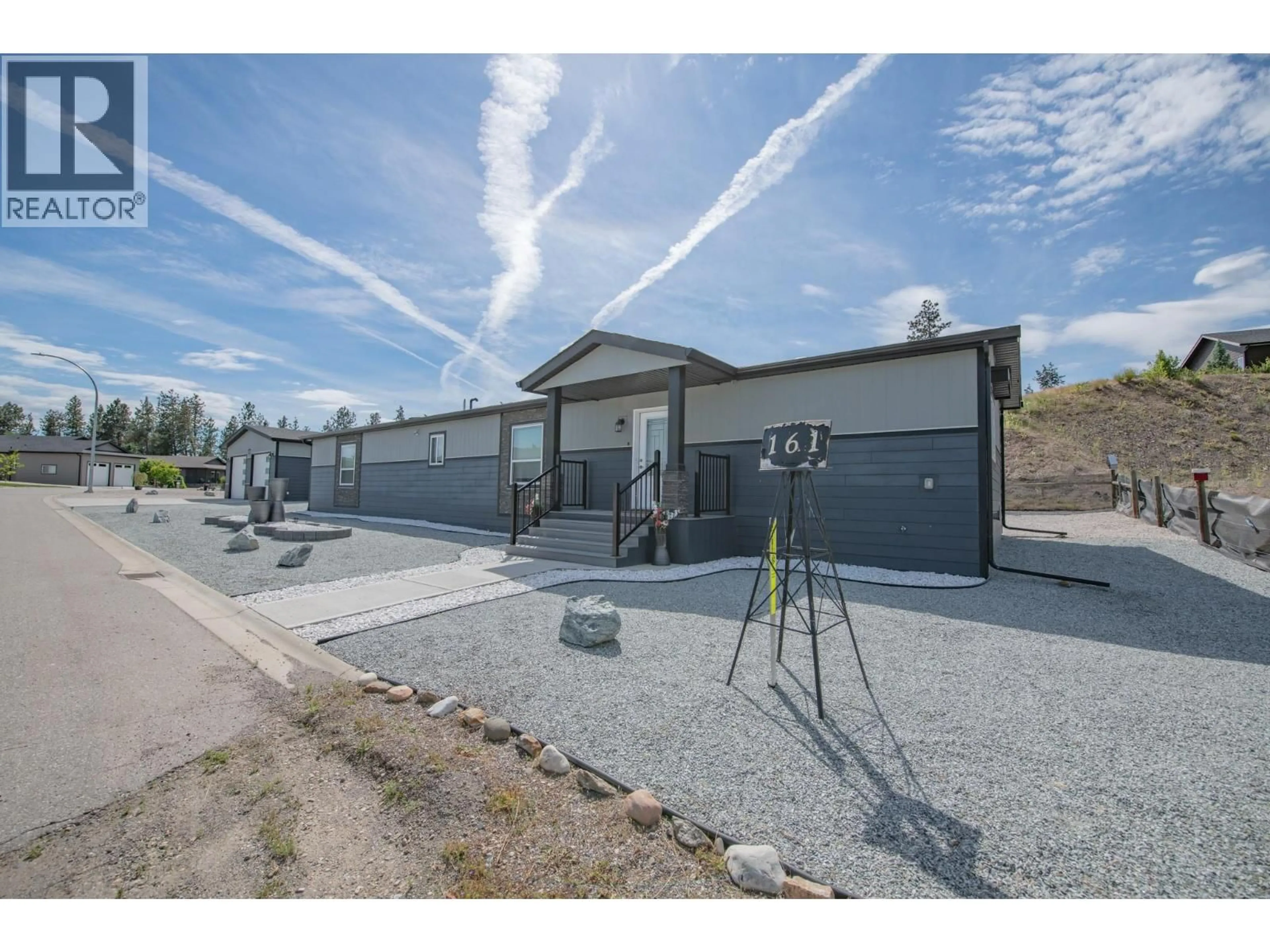 A pic from outside/outdoor area/front of a property/back of a property/a pic from drone, building for 161 - 9510 97 HIGHWAY, Vernon British Columbia V1H1R8