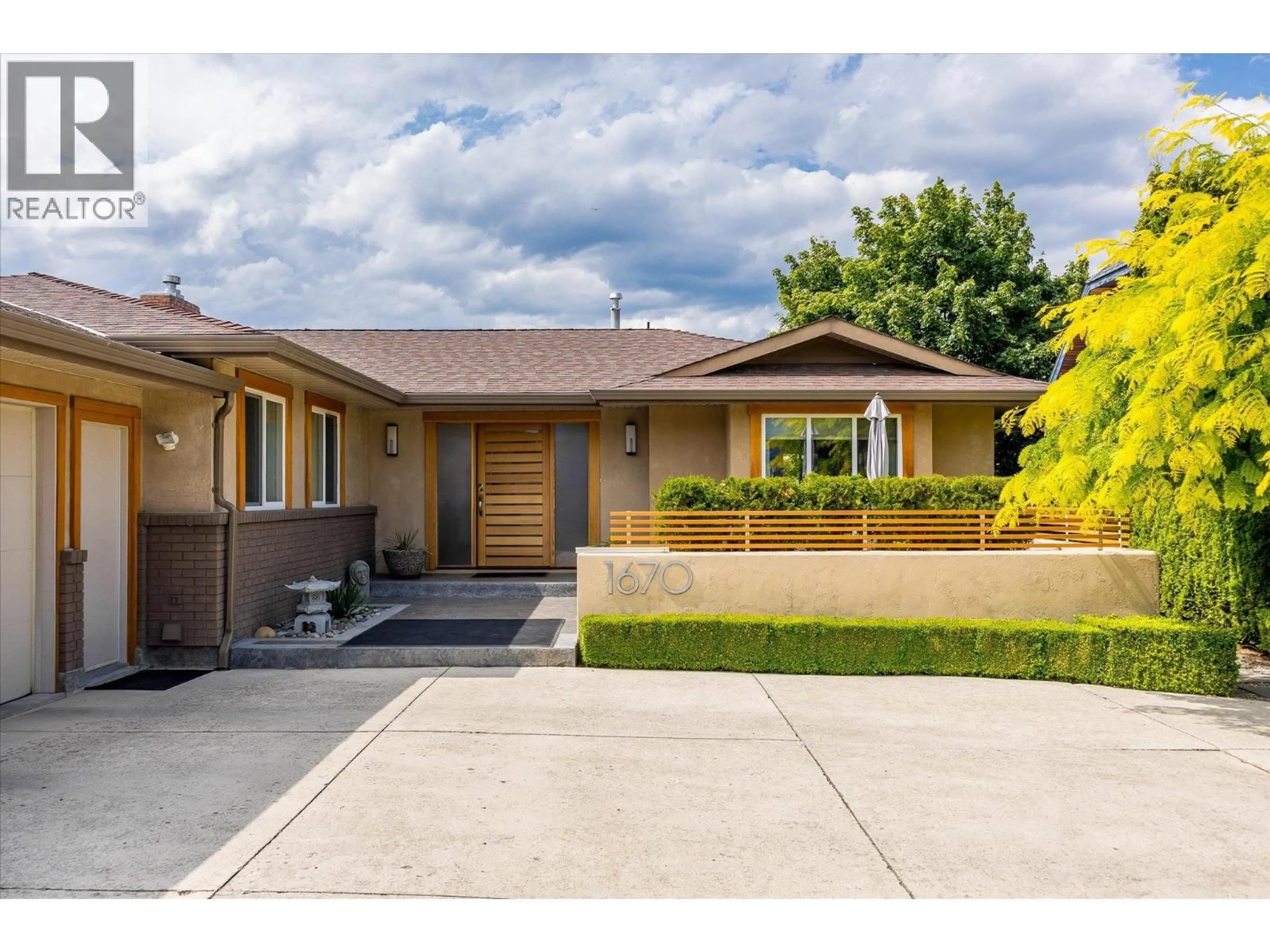 Home with brick exterior material, street for 1670 PRITCHARD DRIVE, West Kelowna British Columbia V4T1X5