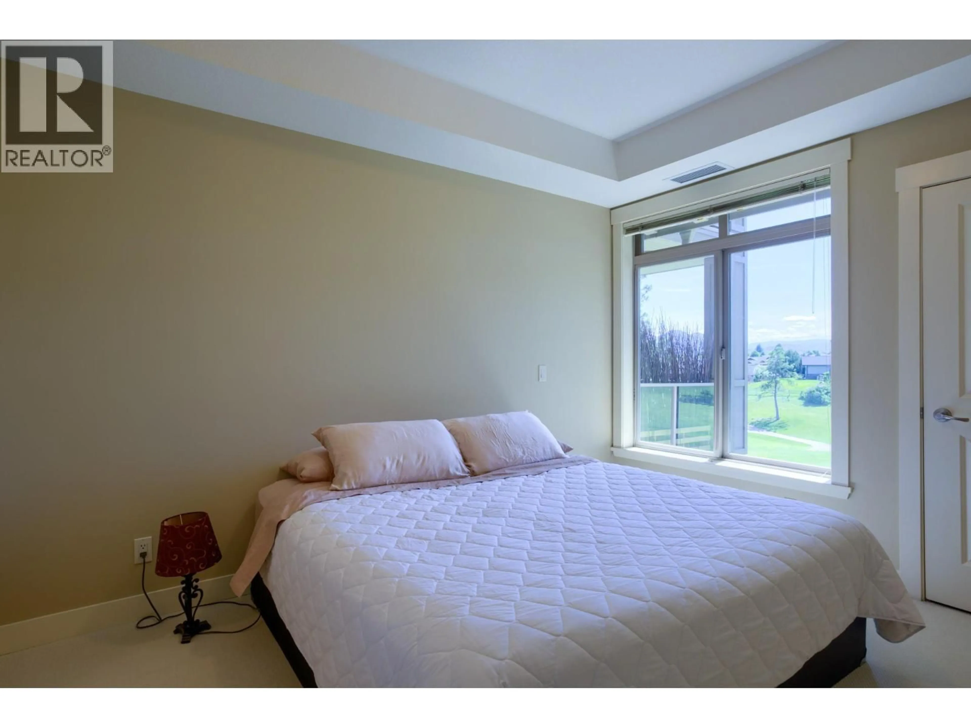 Bedroom with bed, unknown for 206 - 3533 CARRINGTON ROAD, West Kelowna British Columbia V4T2Z9