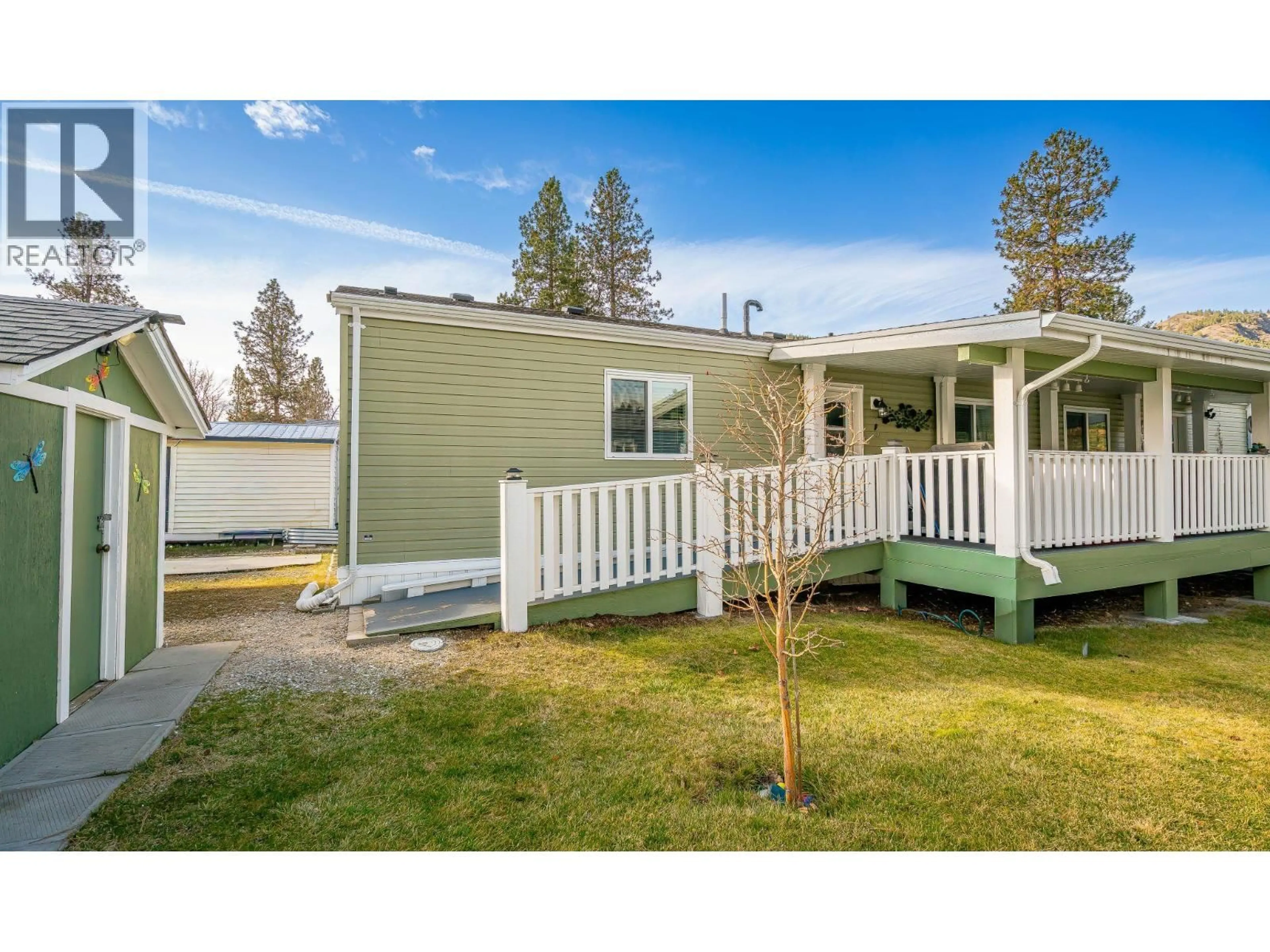 Home with vinyl exterior material, street for C11 - 4505 MCLEAN CREEK ROAD, Okanagan Falls British Columbia V0H1R1