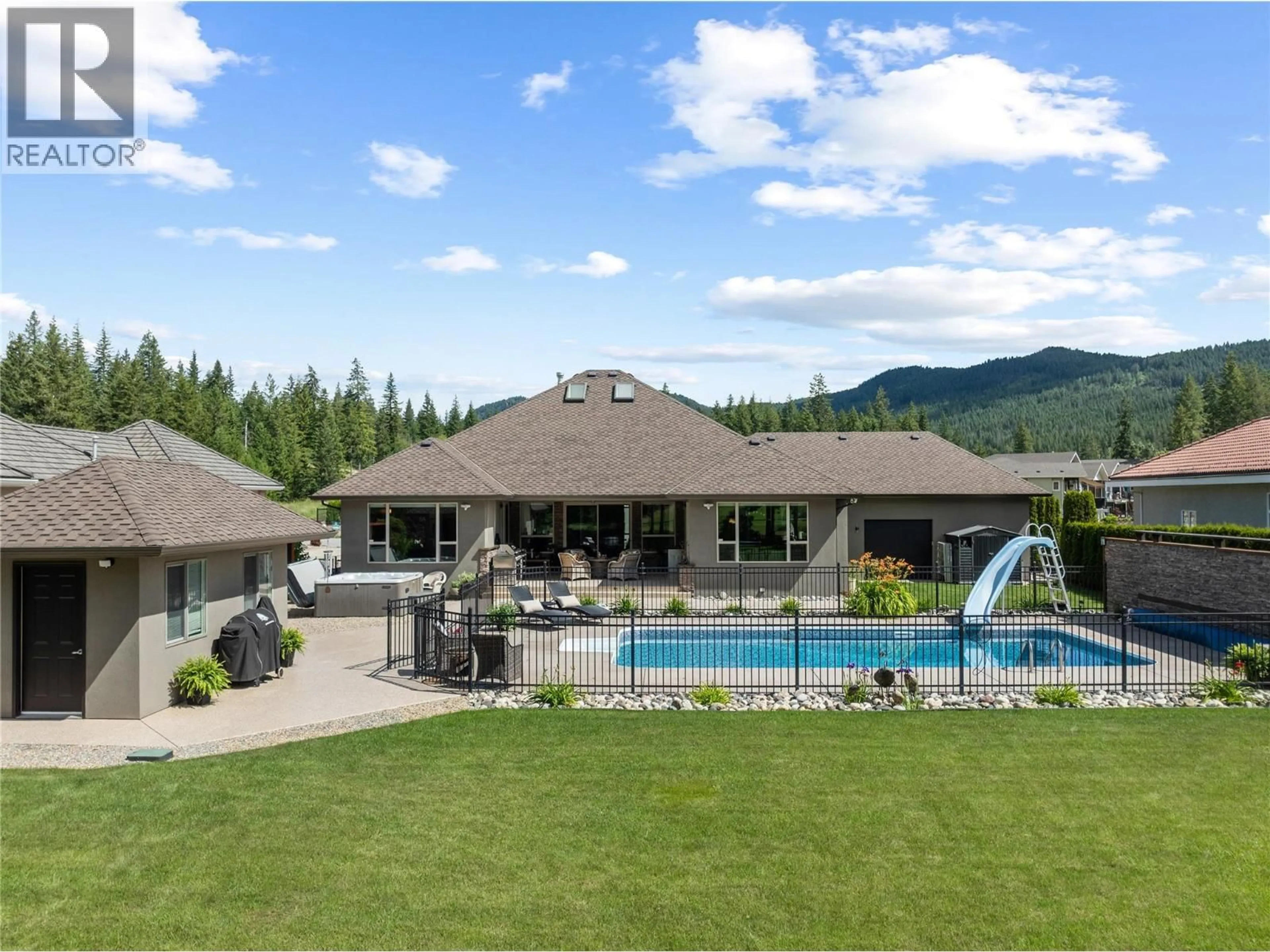A pic from outside/outdoor area/front of a property/back of a property/a pic from drone, mountain view for 2714 GOLF COURSE DRIVE, Blind Bay British Columbia V0E1H2
